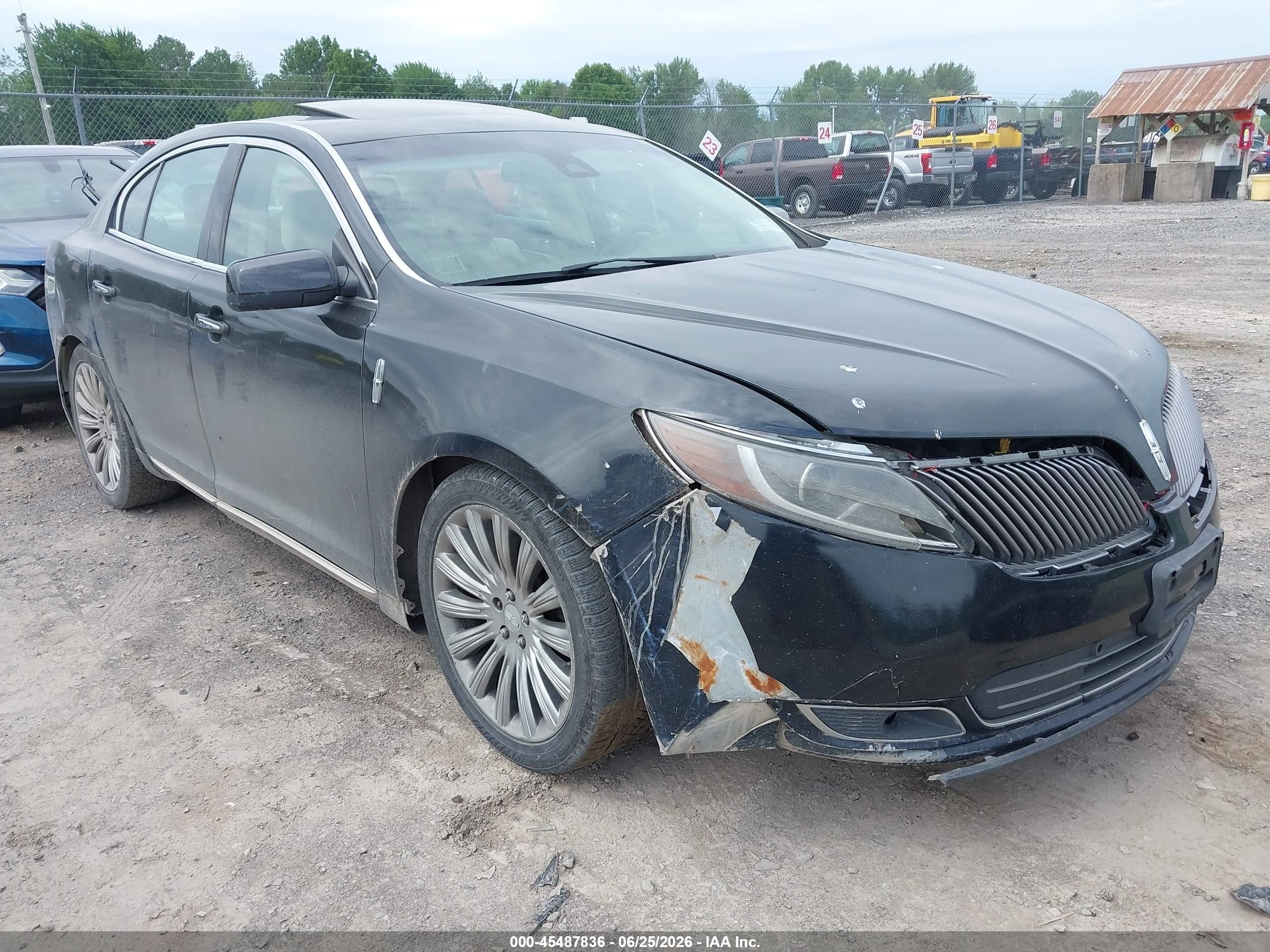 2013 Lincoln MKS, VIN 1LNHL9EKXDG606763 — Normal wear