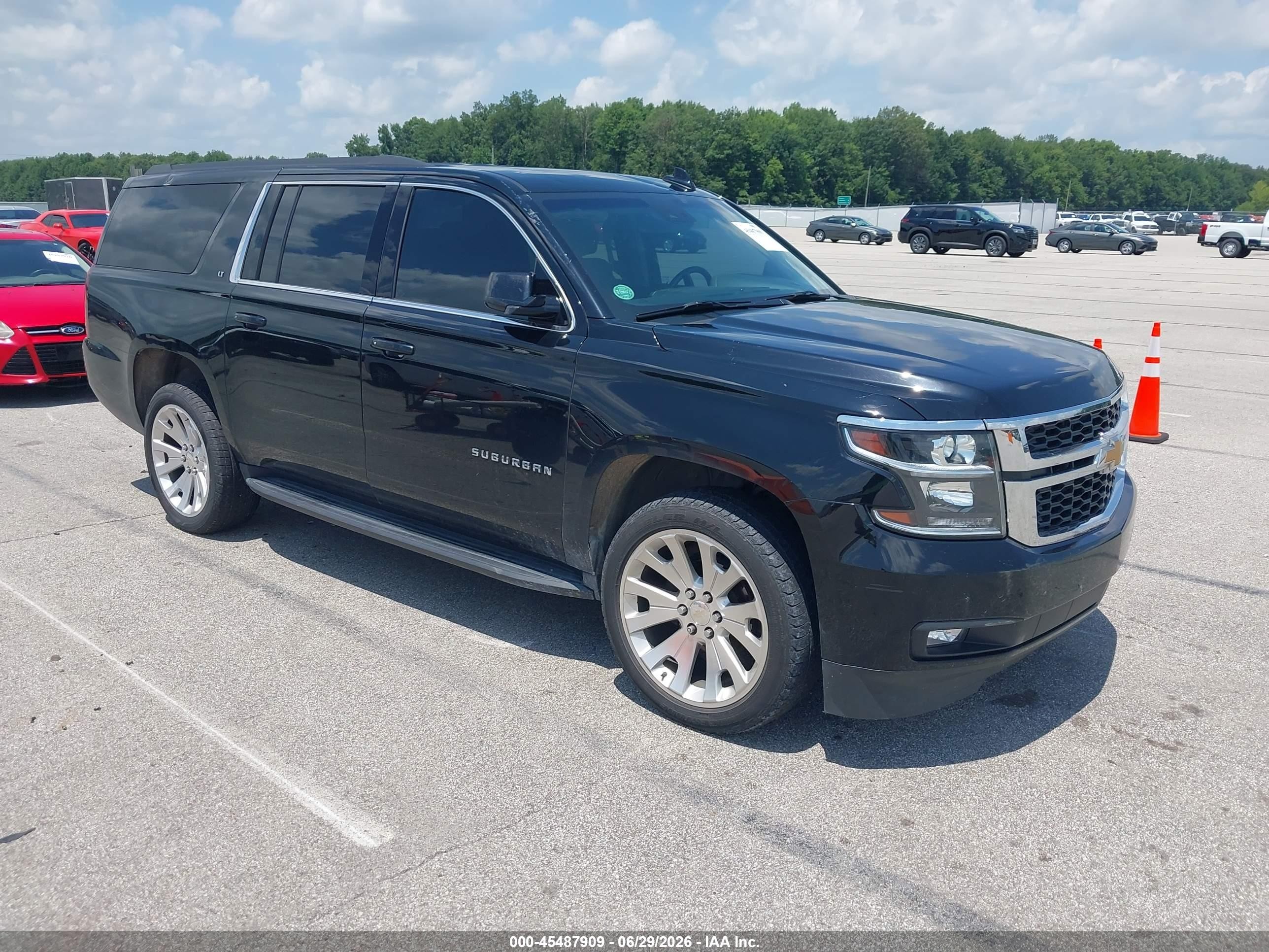 2019 Chevrolet Suburban LT, VIN 1GNSKHKC0KR398115 — Storm