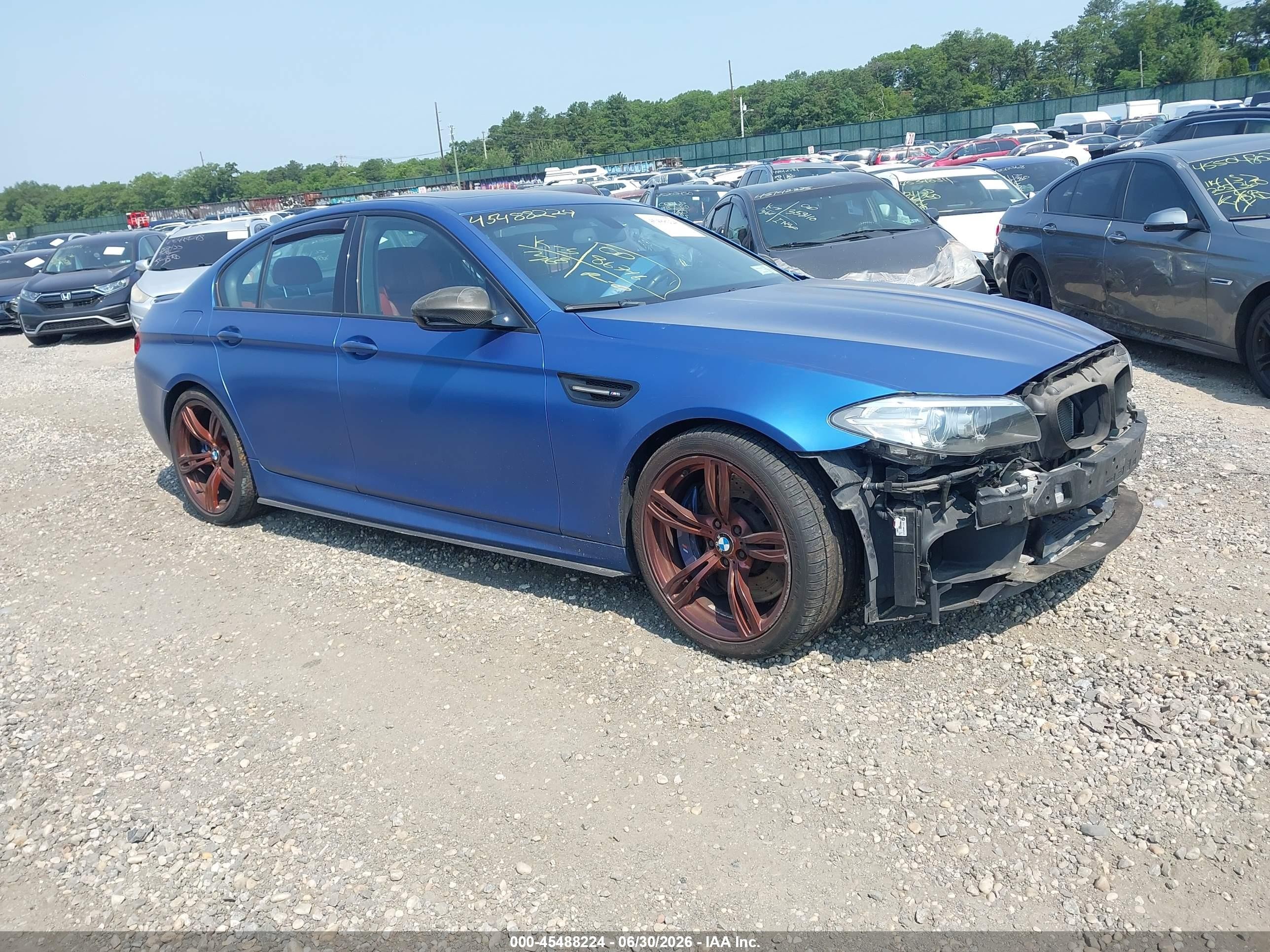 2014 BMW M5, VIN WBSFV9C51ED593867 — Side