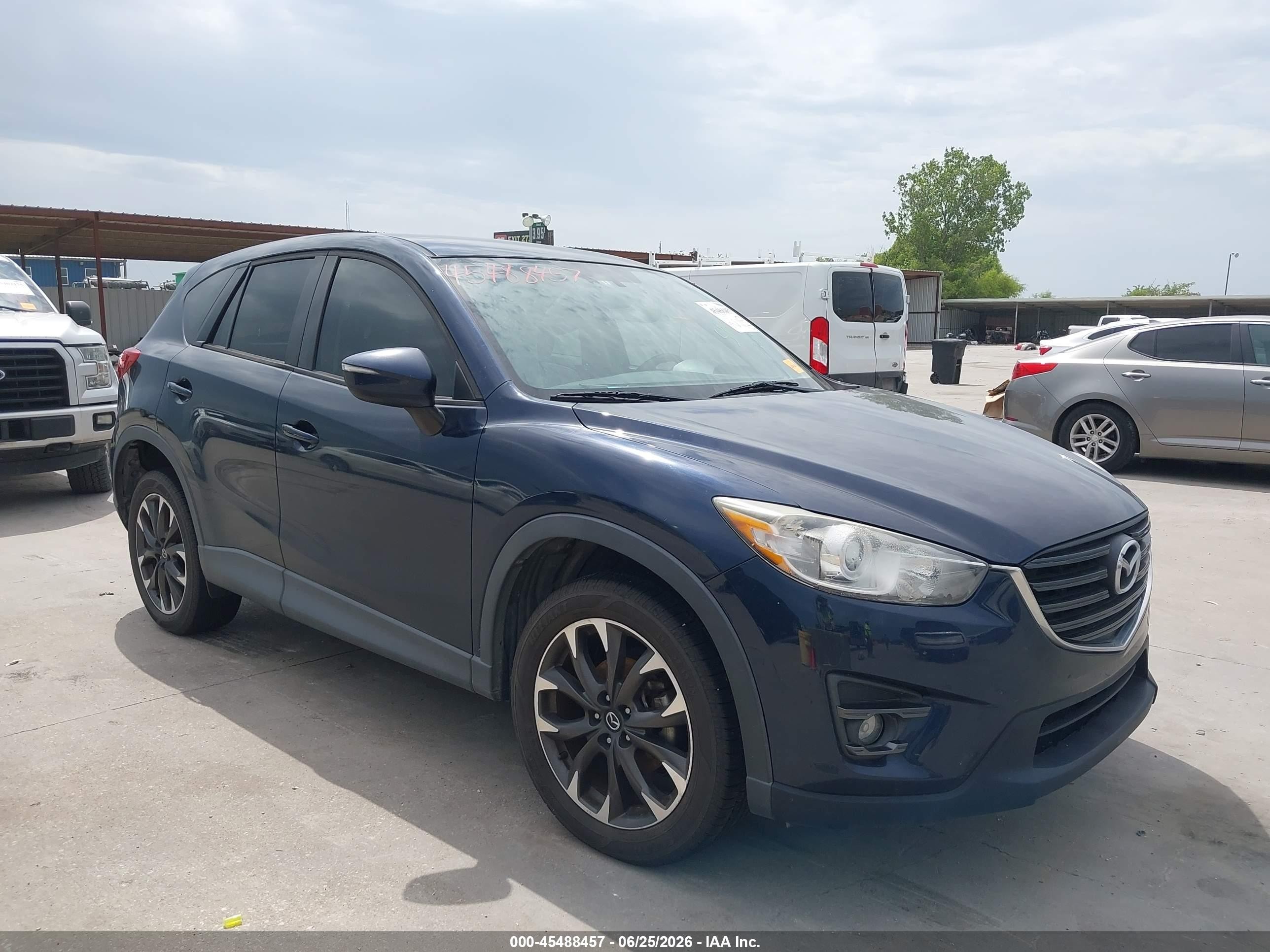 2016 Mazda CX-5 Grand Touring, VIN JM3KE2DYXG0906793 — Water / flood