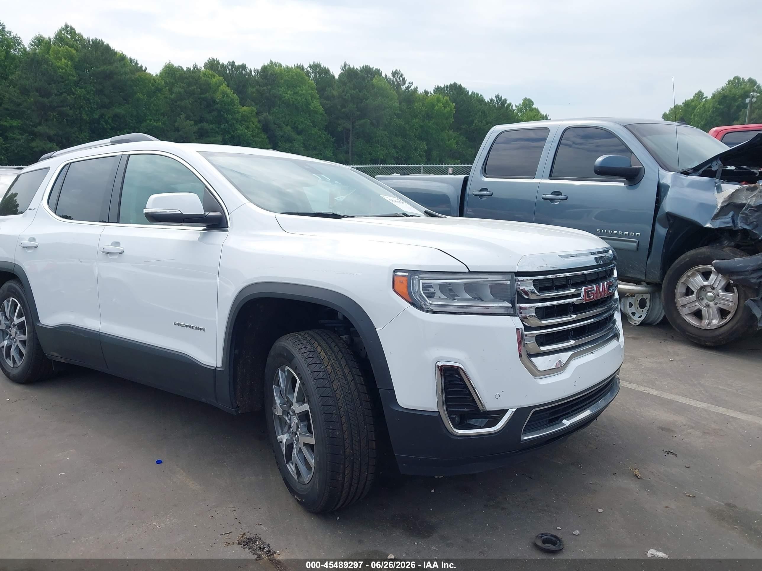 2023 GMC Acadia SLT, VIN 1GKKNML42PZ149942 — Бок