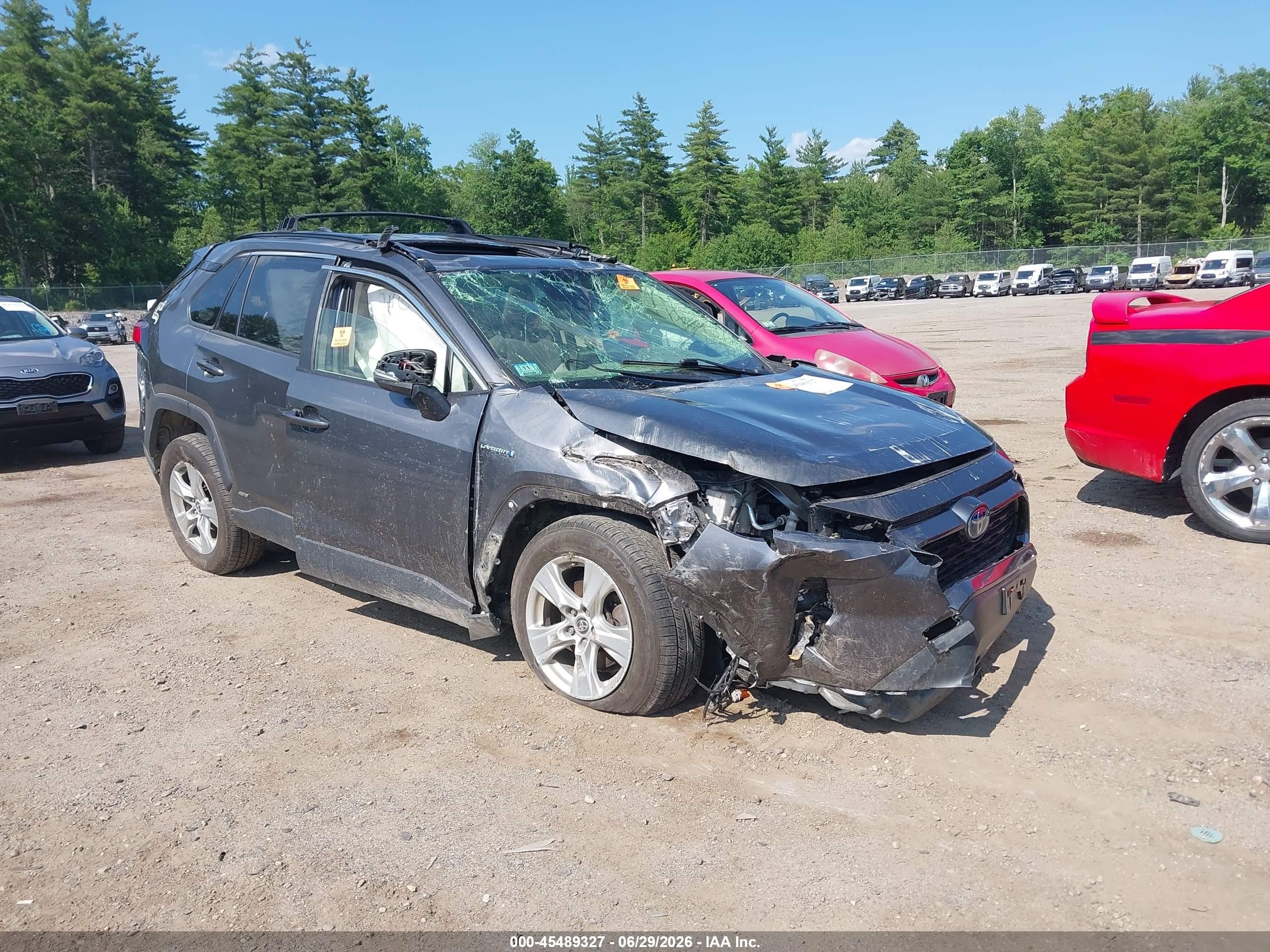 2019 Toyota RAV4 Hybrid XLE, VIN JTMRWRFVXKD500045 — Rollover