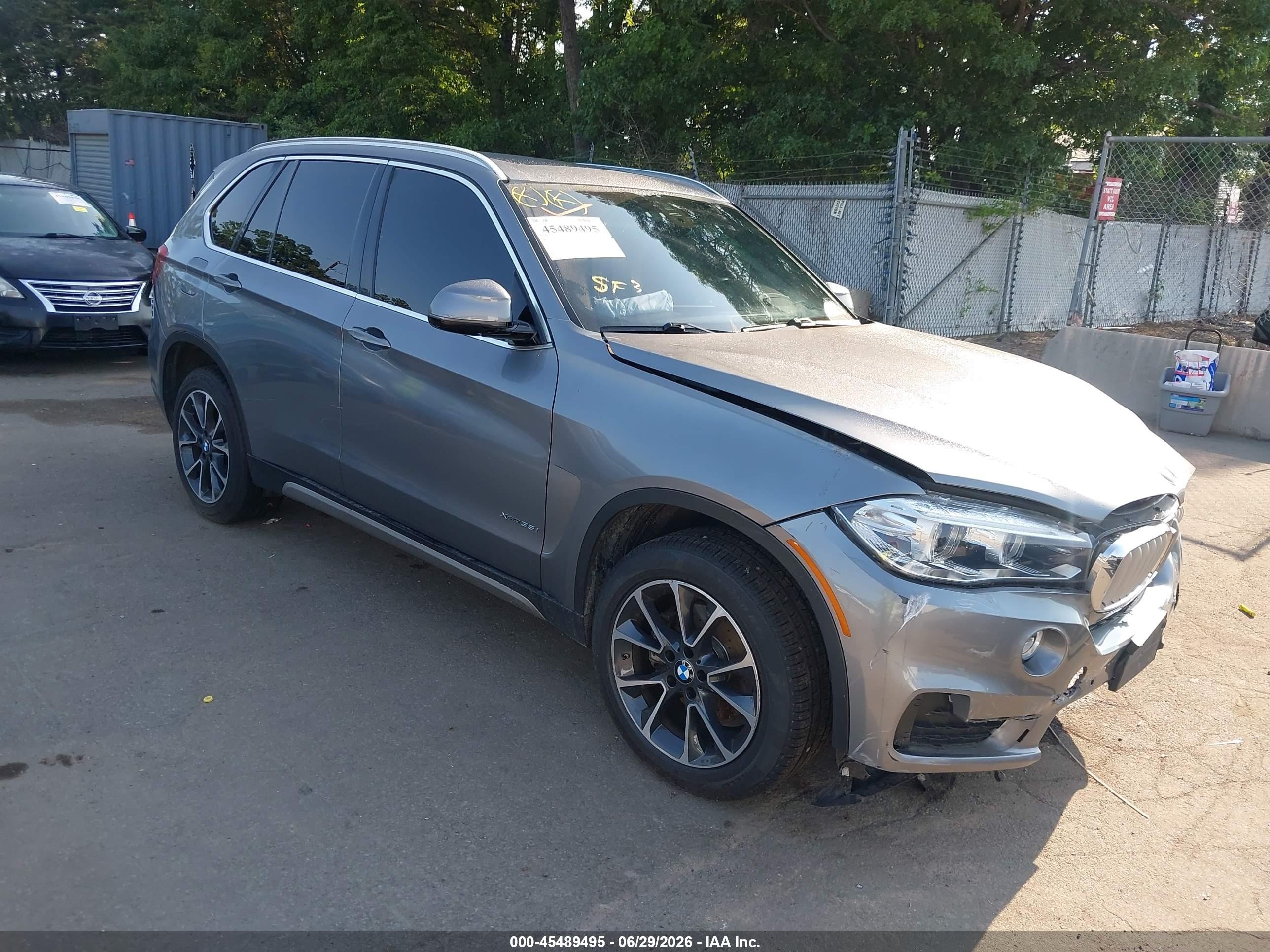 2018 BMW X5 xDrive35i, VIN 5UXKR0C58J0Y01765 — Side
