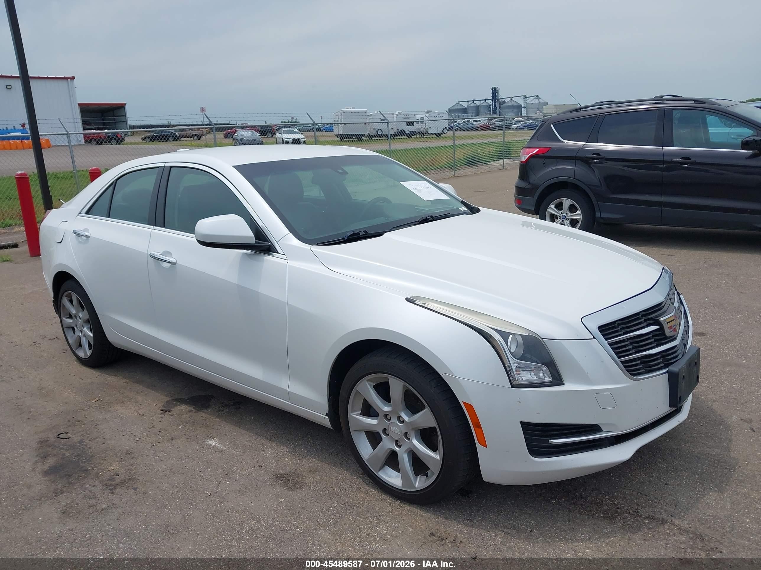 2015 Cadillac ATS Standard AWD, VIN 1G6AG5RX2F0117703 — Front end