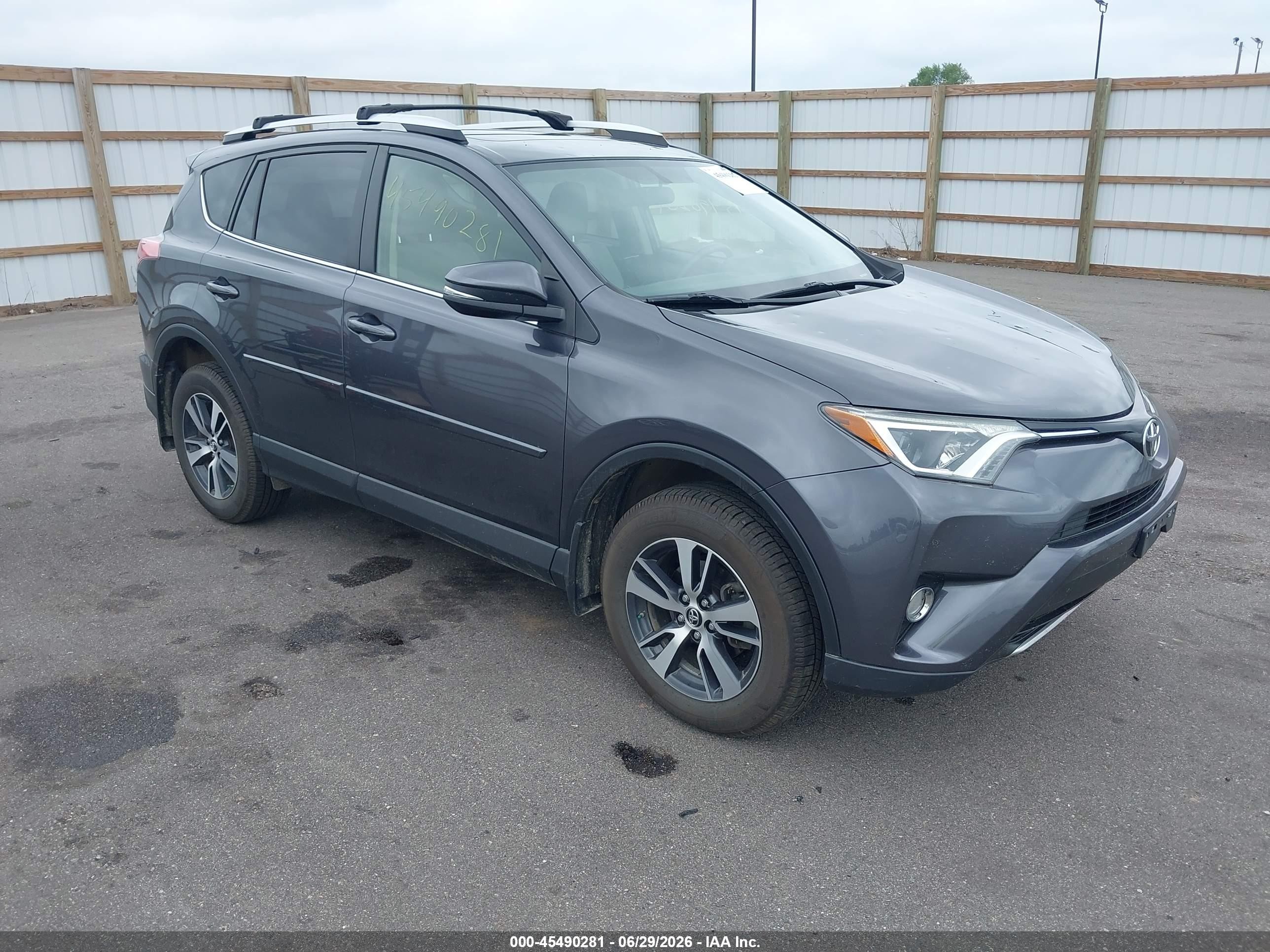 2016 Toyota RAV4 XLE, VIN JTMRFREV9GJ101556 — Hail