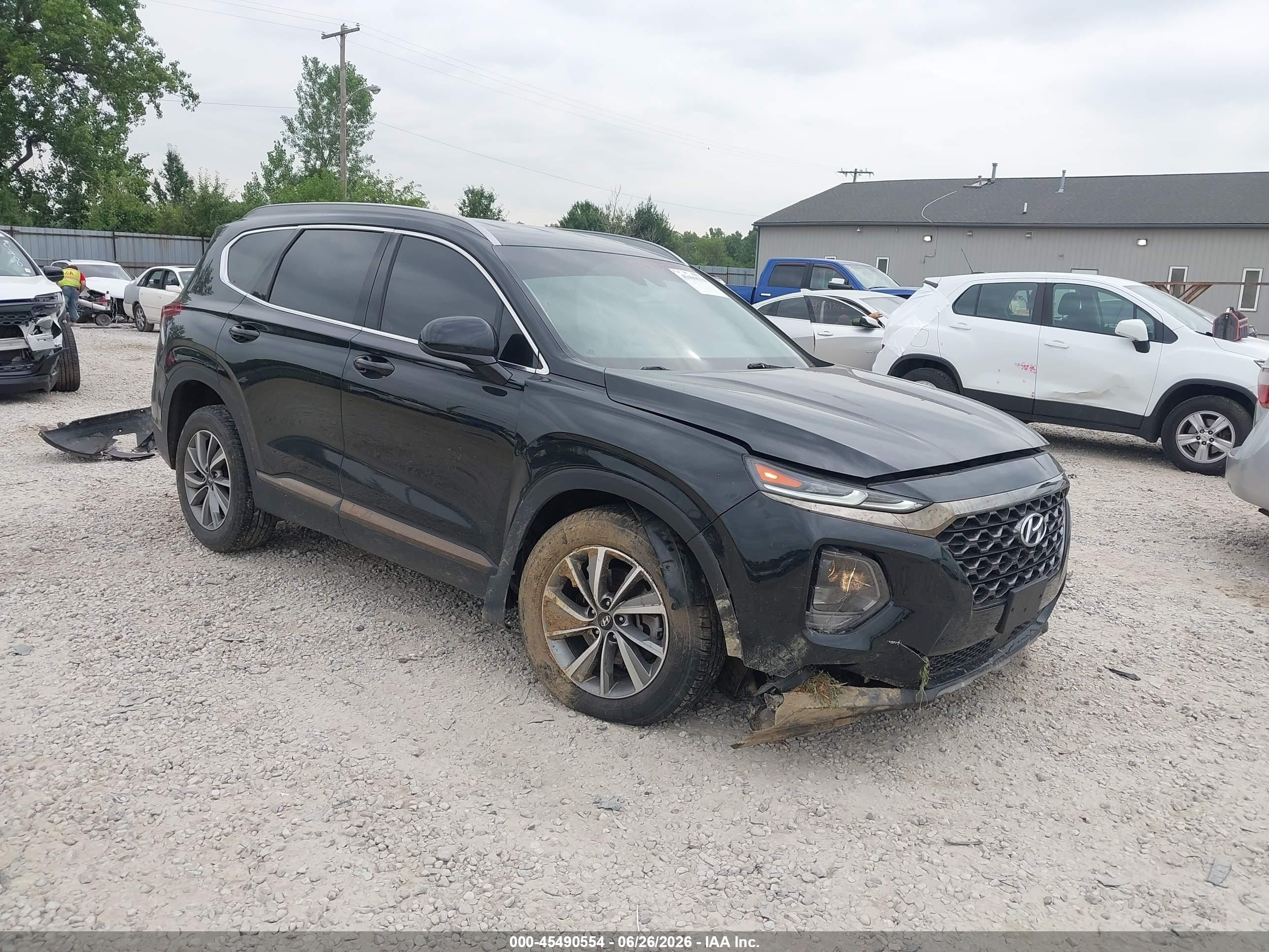 2019 Hyundai Santa Fe SEL, VIN 5NMS3CAD2KH047326 — Front end