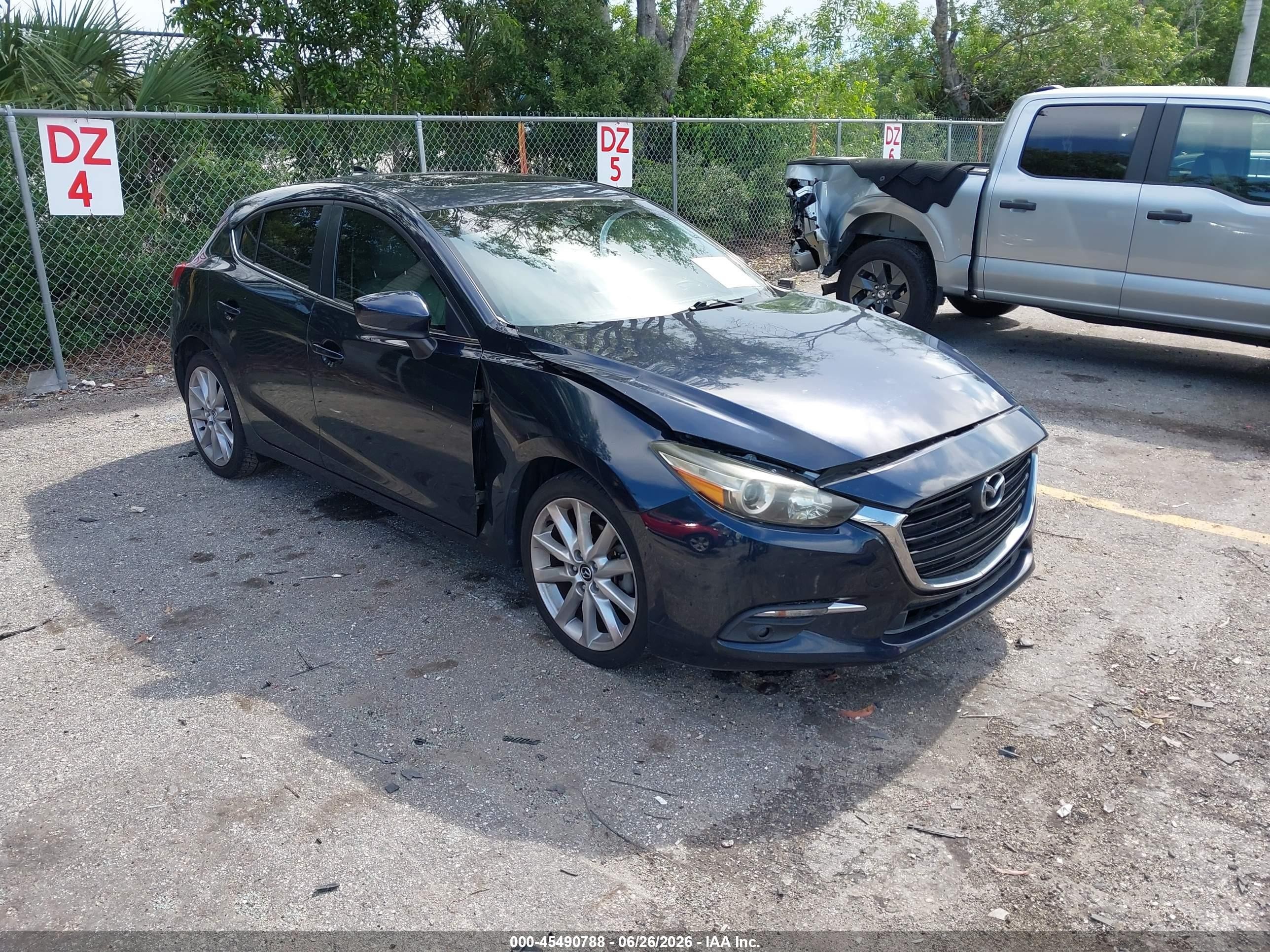 2017 Mazda 3 Grand Touring, VIN 3MZBN1M31HM133568 — Front end