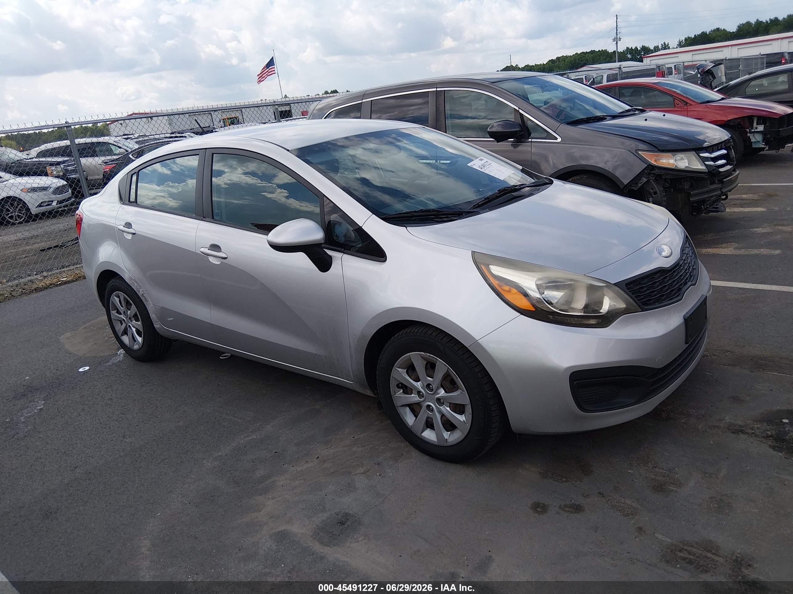 2013 Kia Rio LX, VIN KNADM4A3XD6219439 — Зад