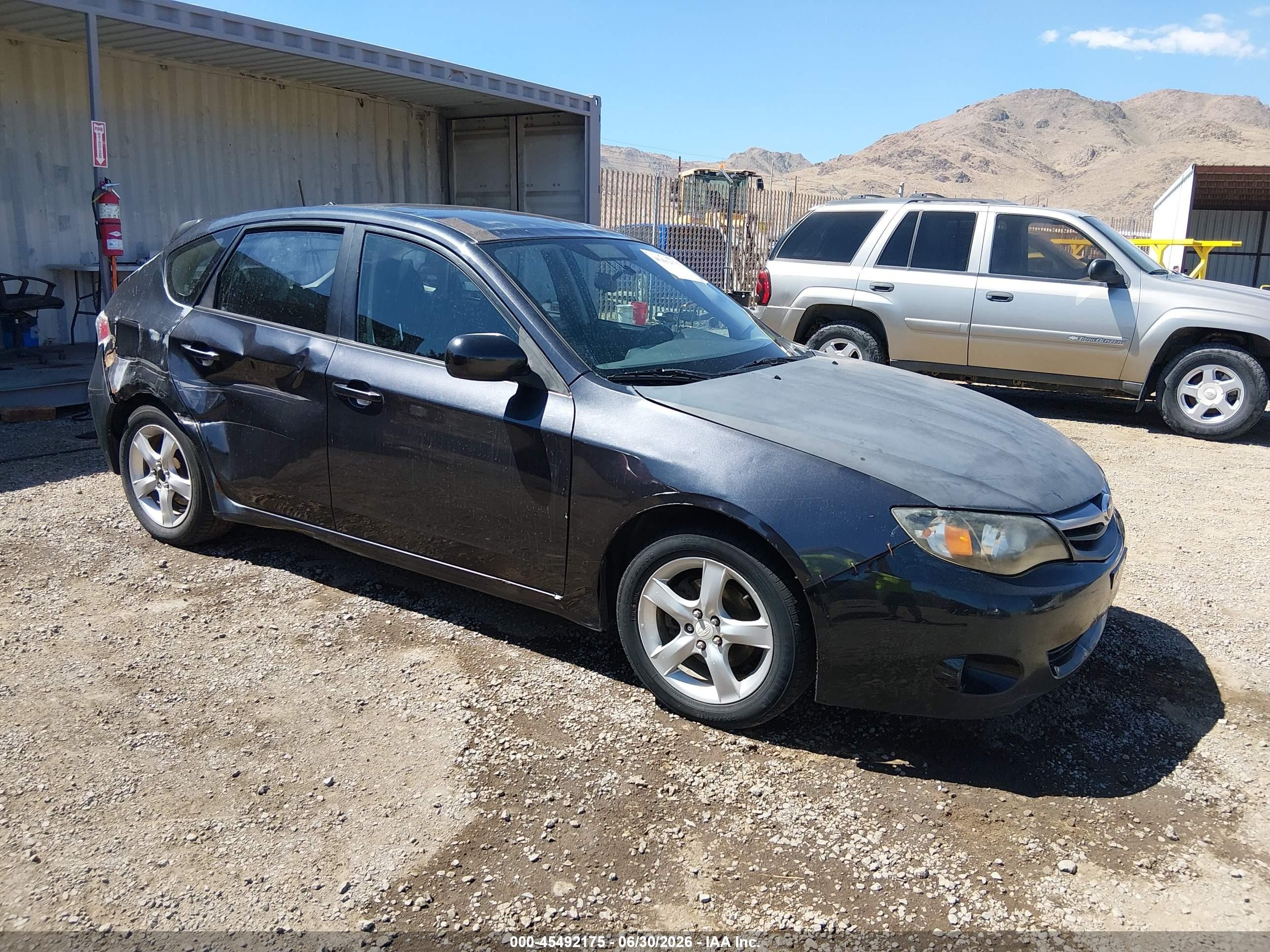 2010 Subaru Impreza i, VIN JF1GH6A63AH814858 — Side