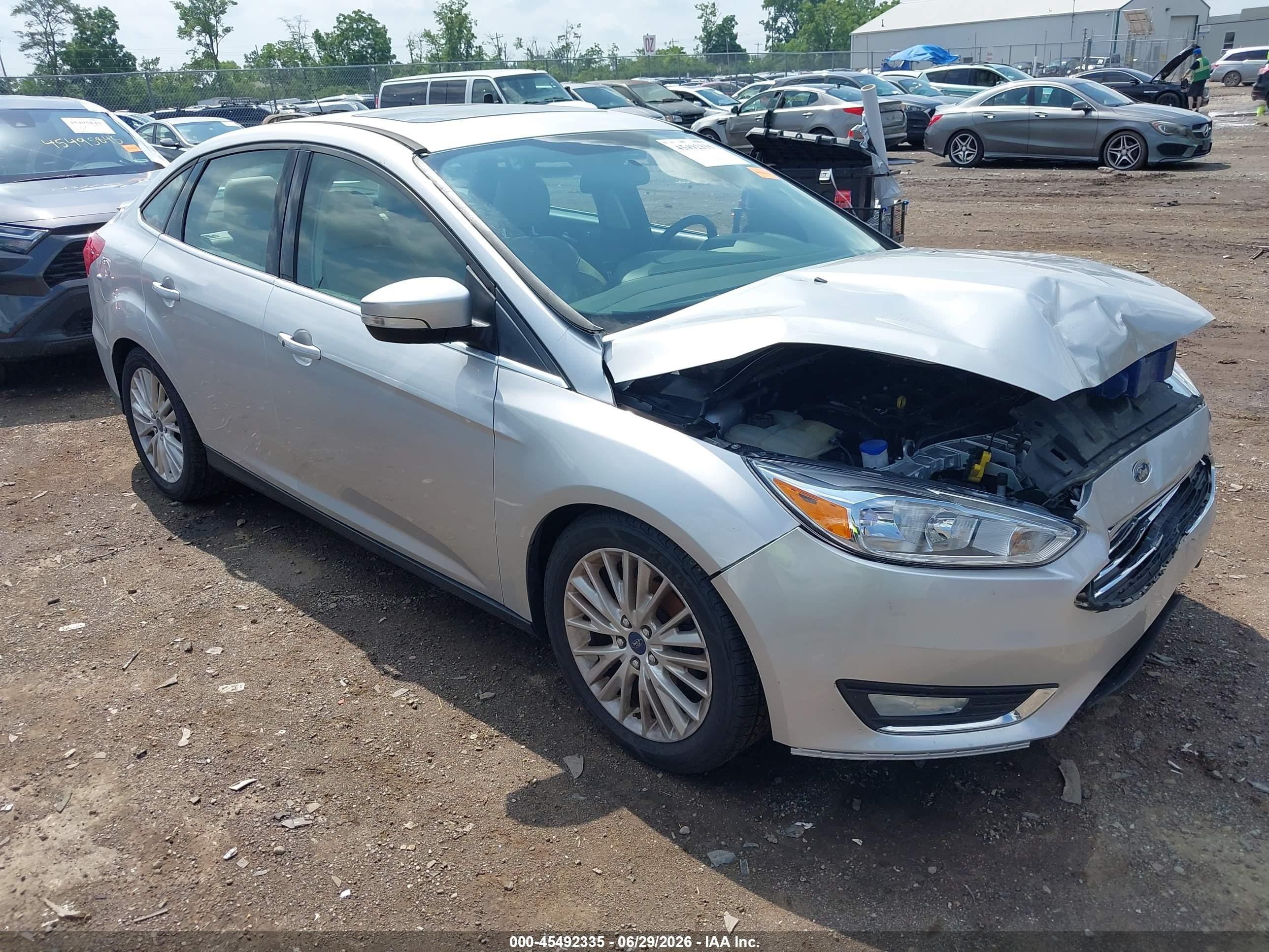 2015 Ford Focus Titanium, VIN 1FADP3J23FL247220 — Front end
