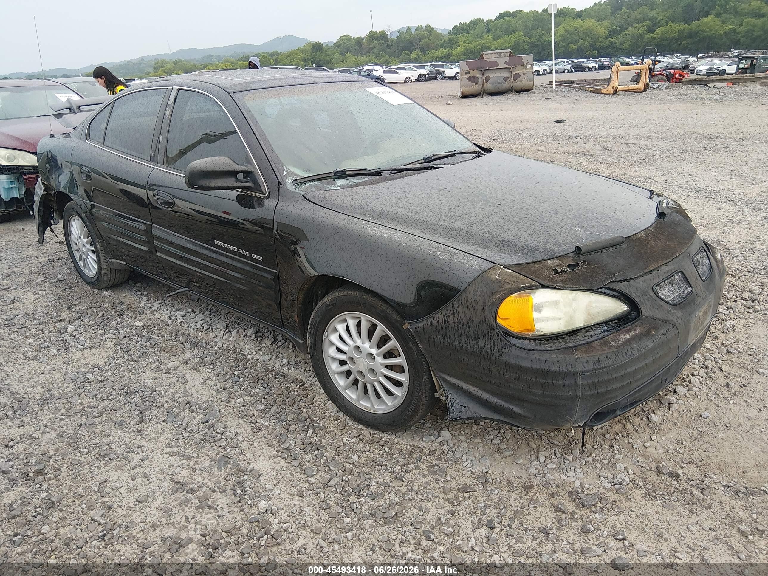 1999 Pontiac Grand Am SE1, VIN 1G2NE52E8XM805622 — Зад