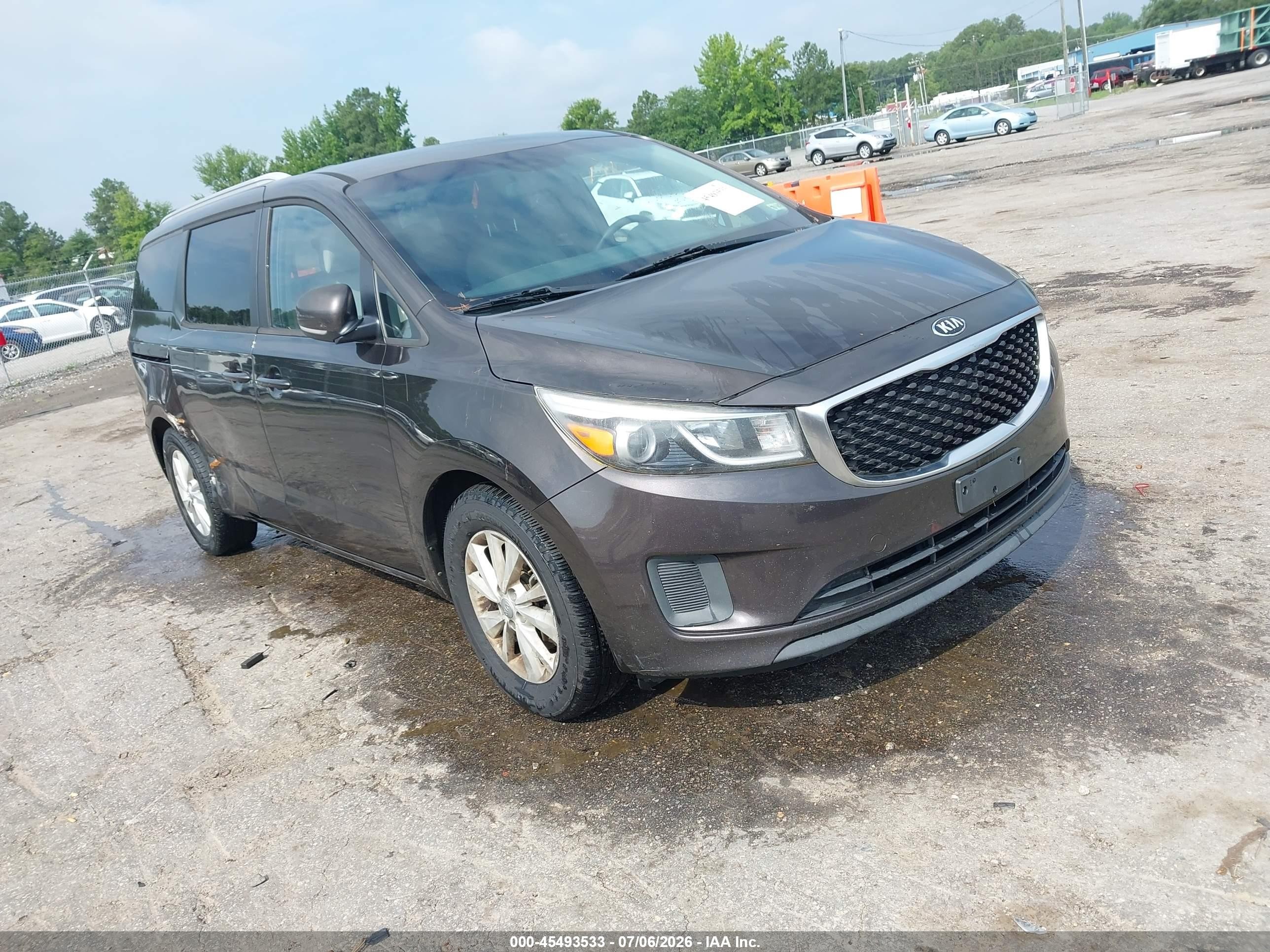 2015 Kia Sedona LX, VIN KNDMB5C10F6038704 — Бок