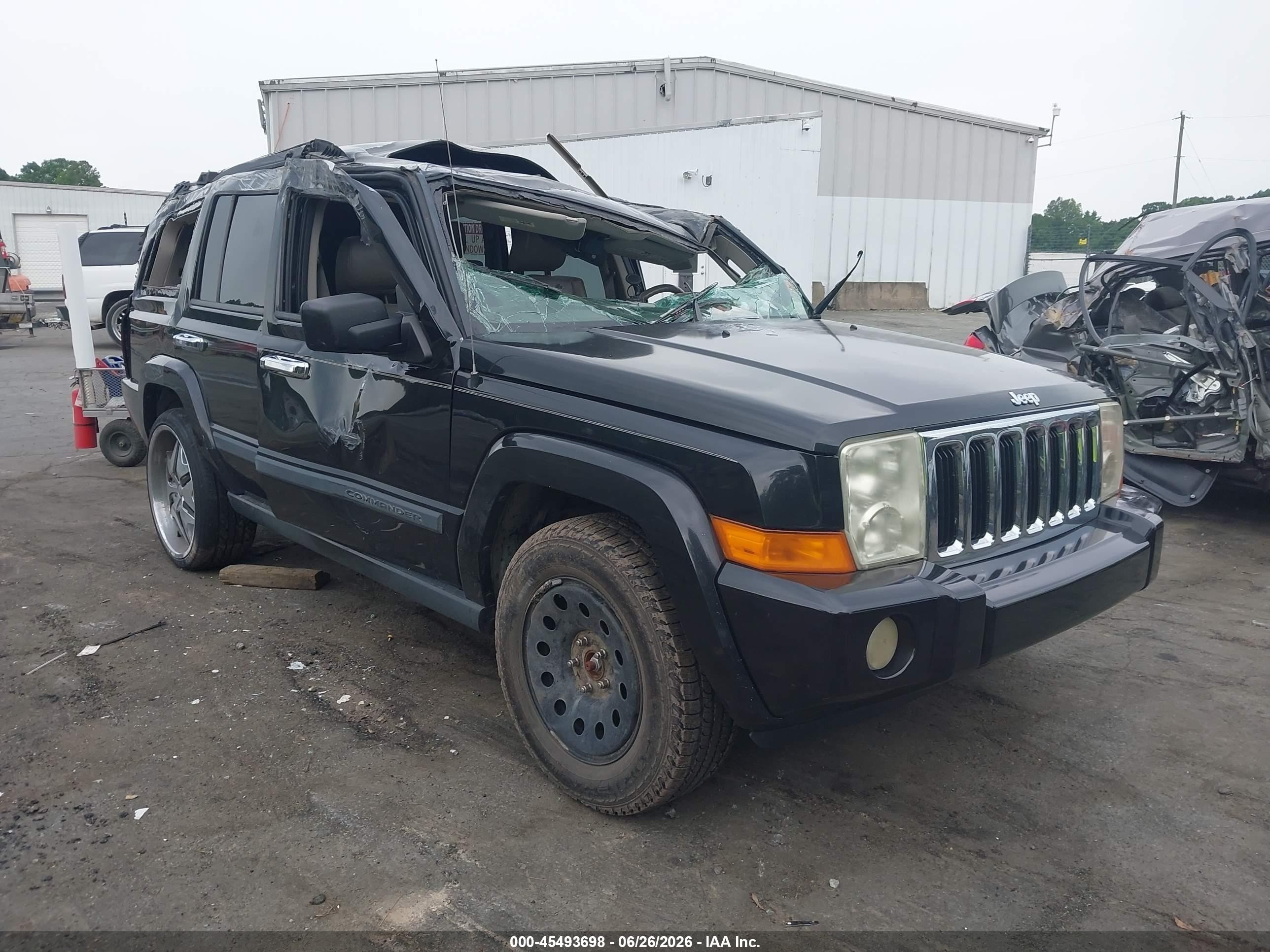 2009 Jeep Commander Sport, VIN 1J8HG48P29C530658 — Rollover