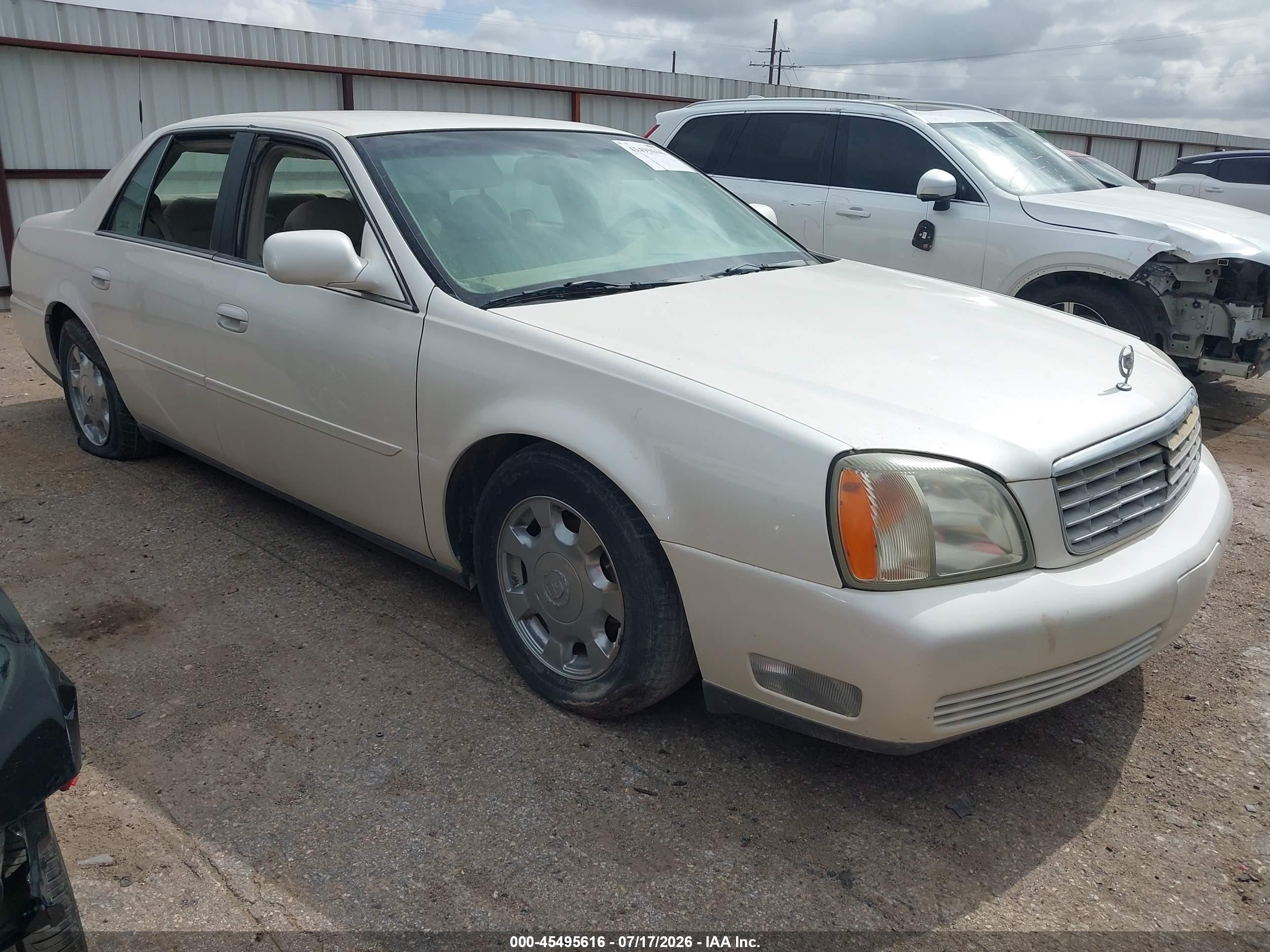 2002 Cadillac DeVille Livery, VIN 1G6KD54Y02U282360 — Hail
