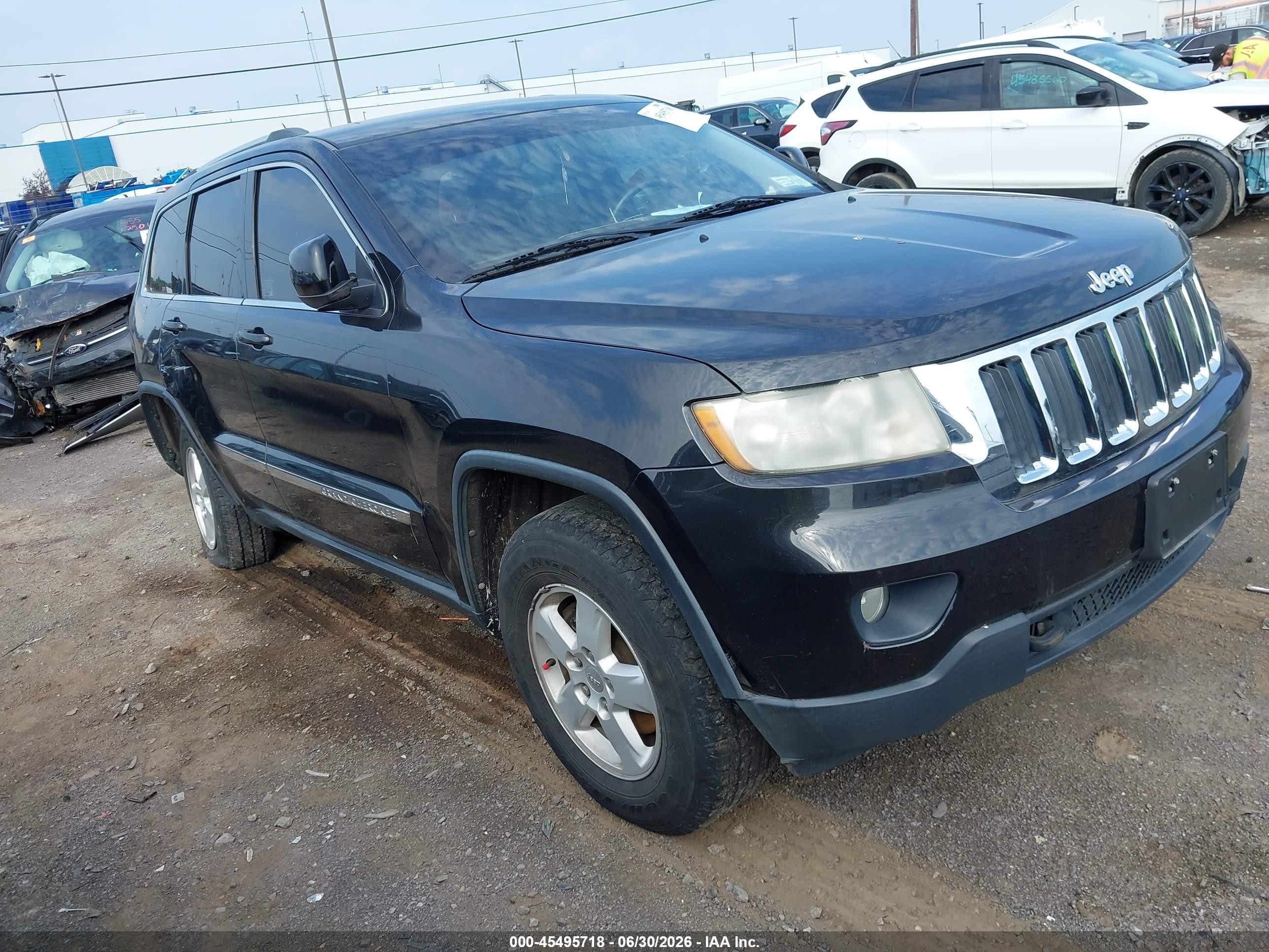 2013 Jeep Grand Cherokee Laredo, VIN 1C4RJFAG4DC559753 — Side