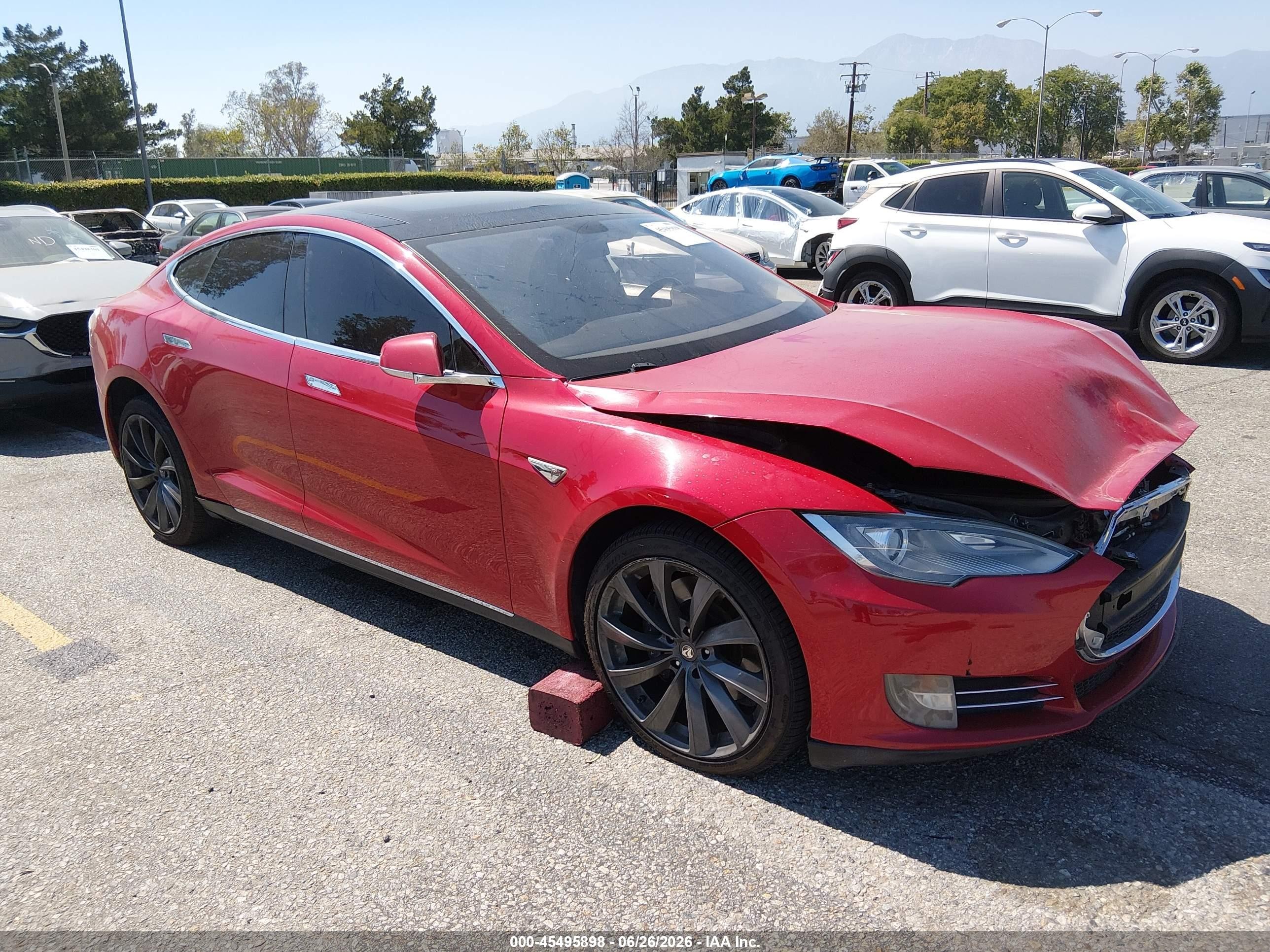 2013 Tesla Model S, VIN 5YJSA1DN7DFP09310 — Фото с аукциона