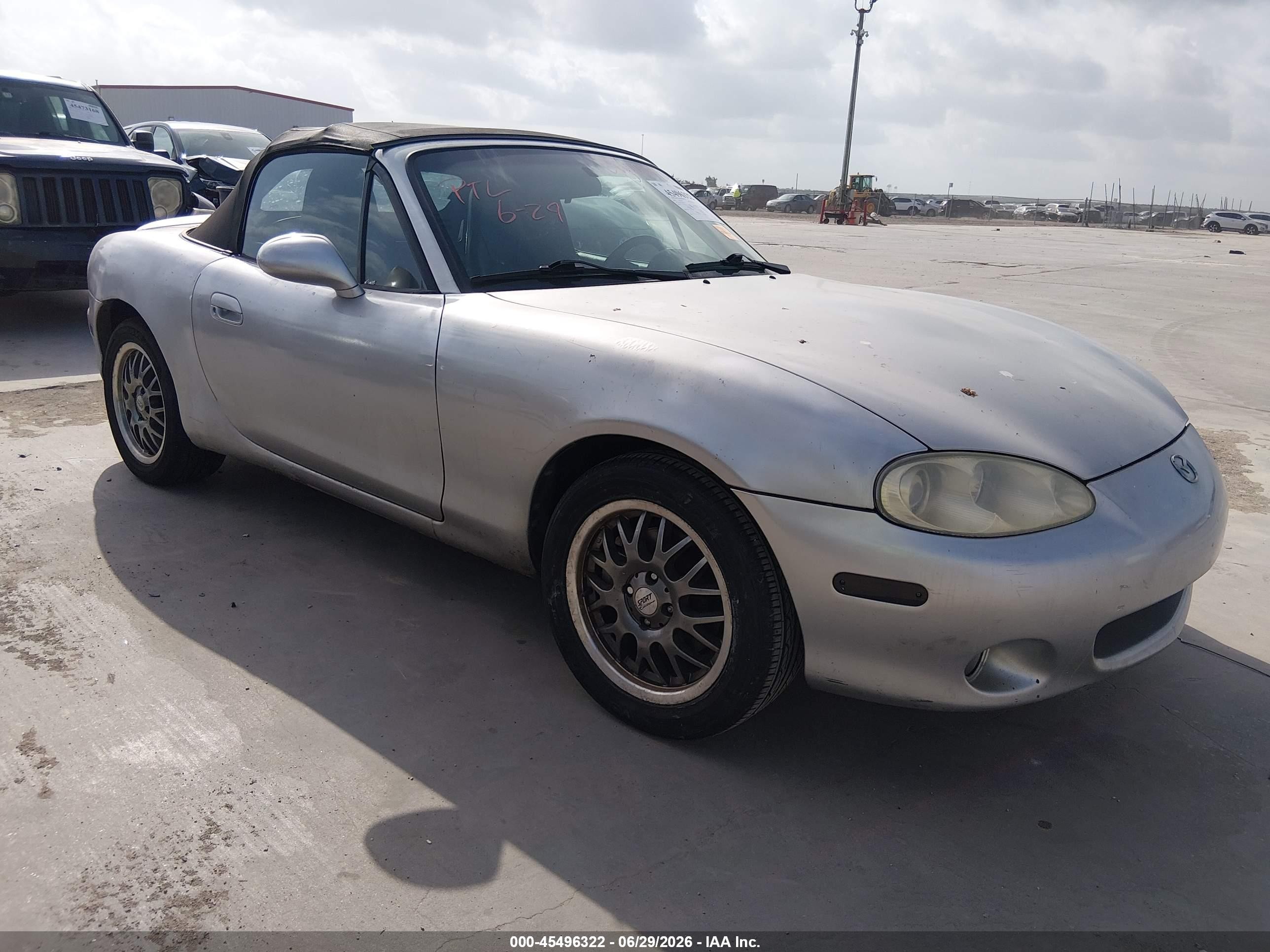 2004 Mazda MX-5 Miata Cloth, VIN JM1NB353840401130 — Перед