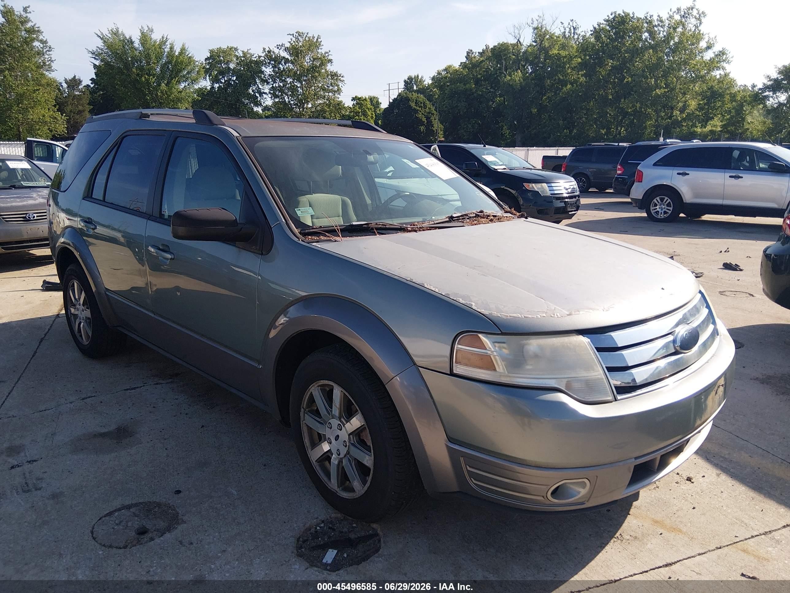 2008 Ford Taurus X SEL, VIN 1FMDK02W78GA16000 — Normal wear