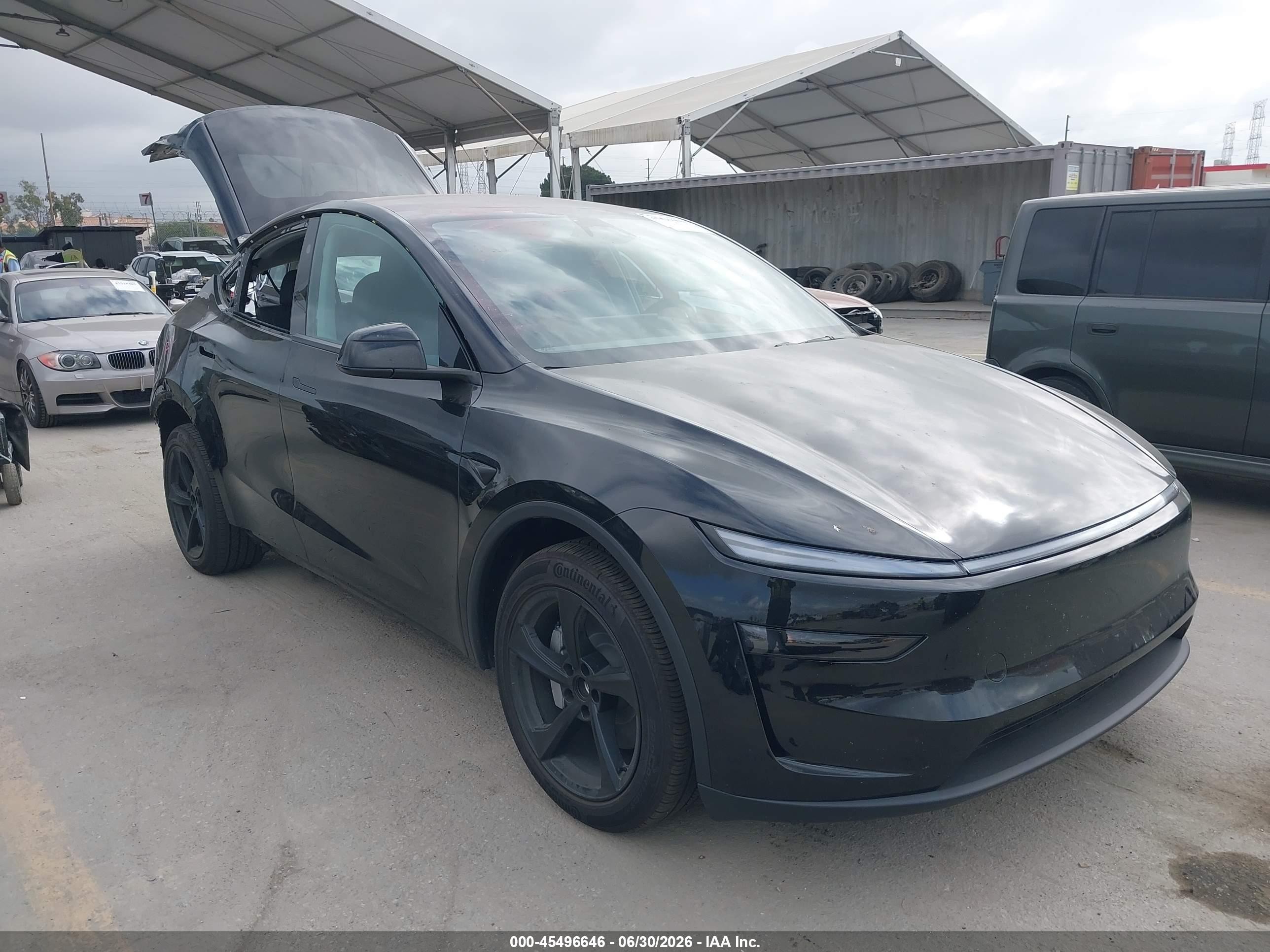 2026 Tesla Model Y Long Range, VIN 7SAYGDED0TF425406 — Rear end