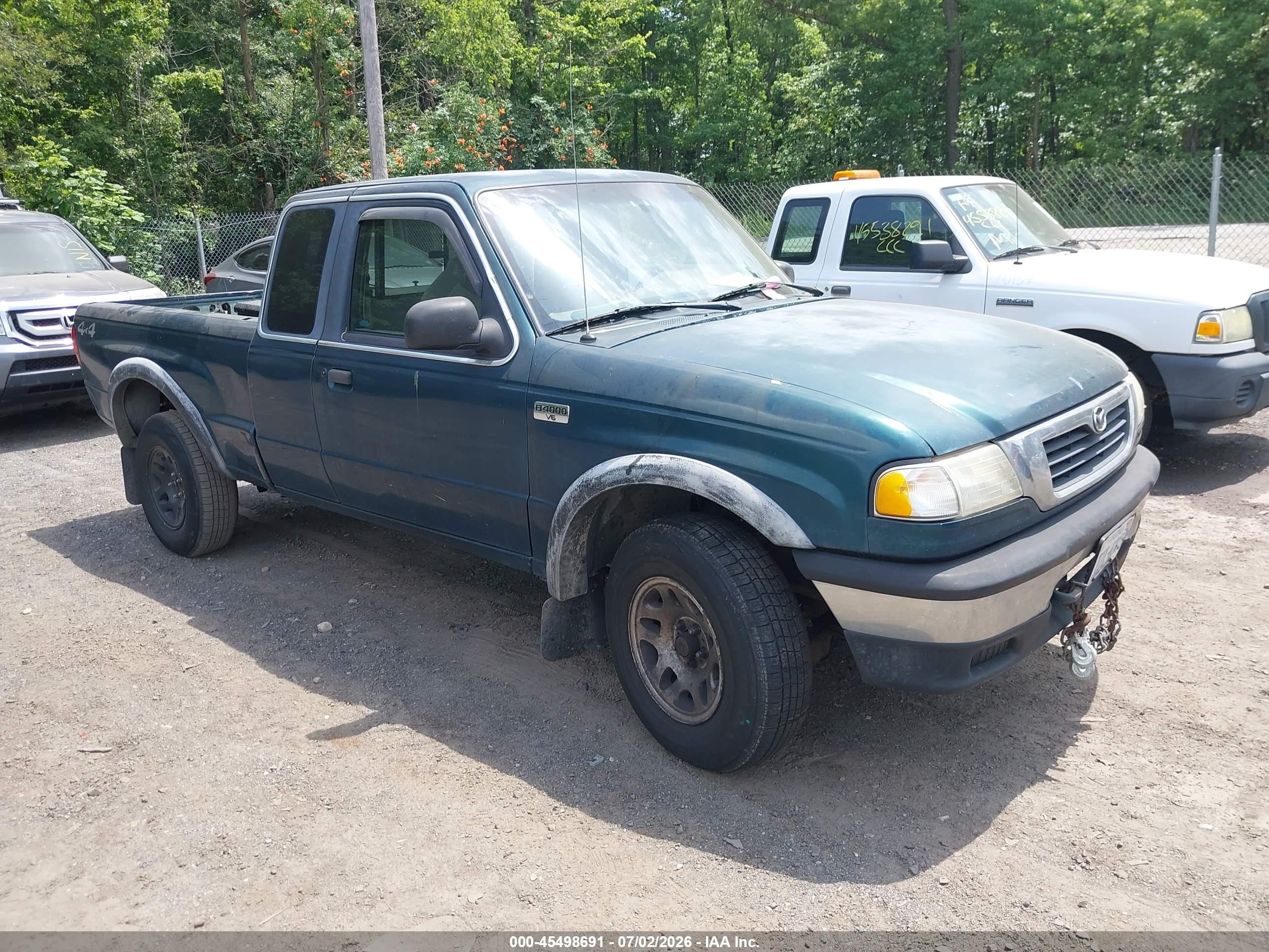 1998 Mazda B-Series SE, VIN 4F4ZR17X6WTM46450 — По всему кузову