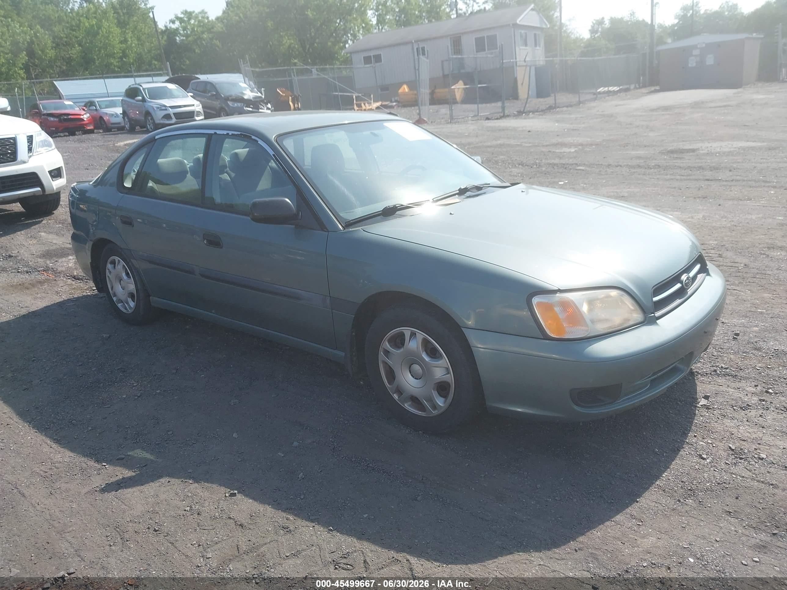 2000 Subaru Legacy L, VIN 4S3BE6355Y7218233 — Зад