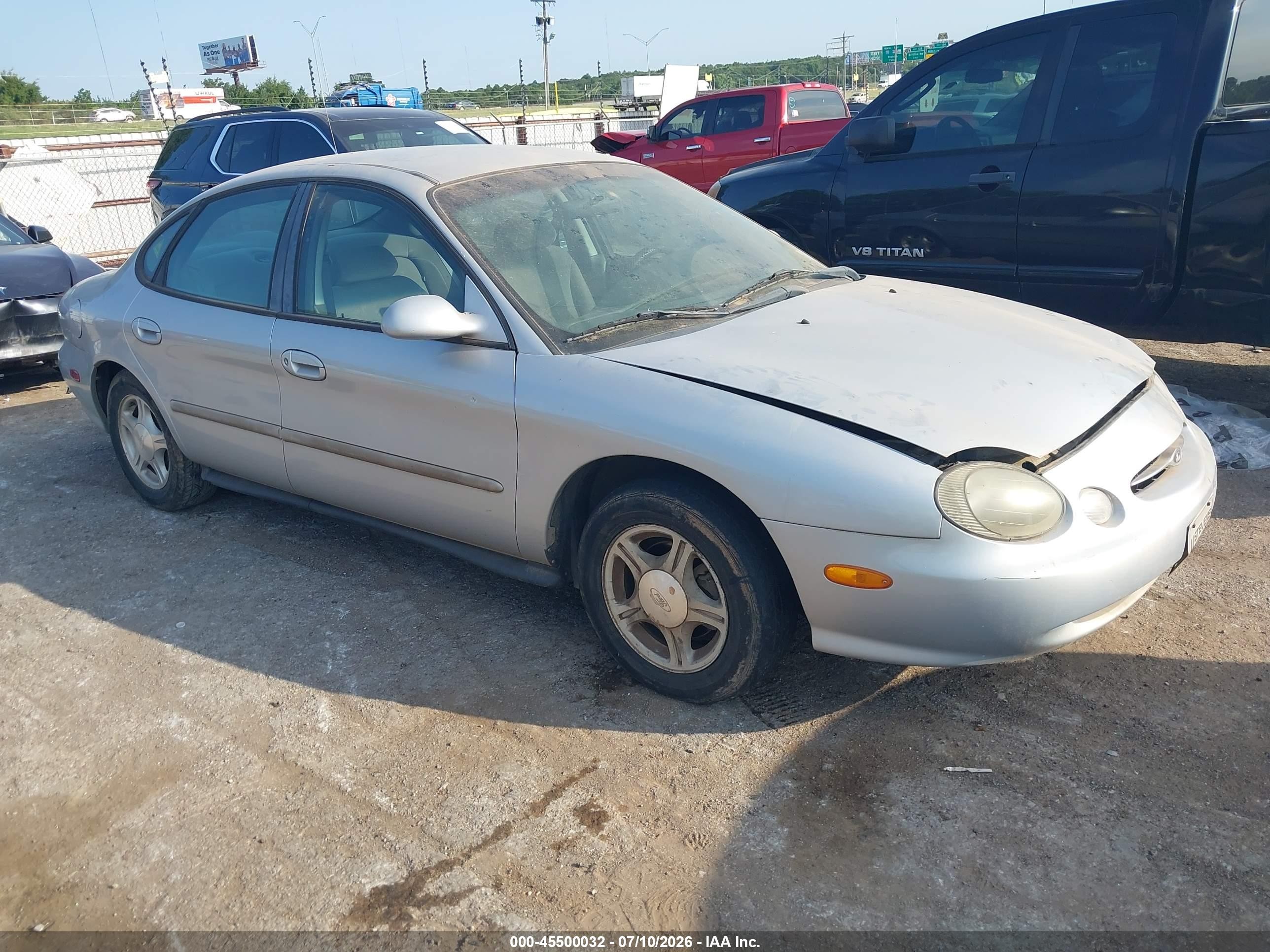 1999 Ford Taurus SE, VIN 1FAFP53U2XG254625 — Normal wear