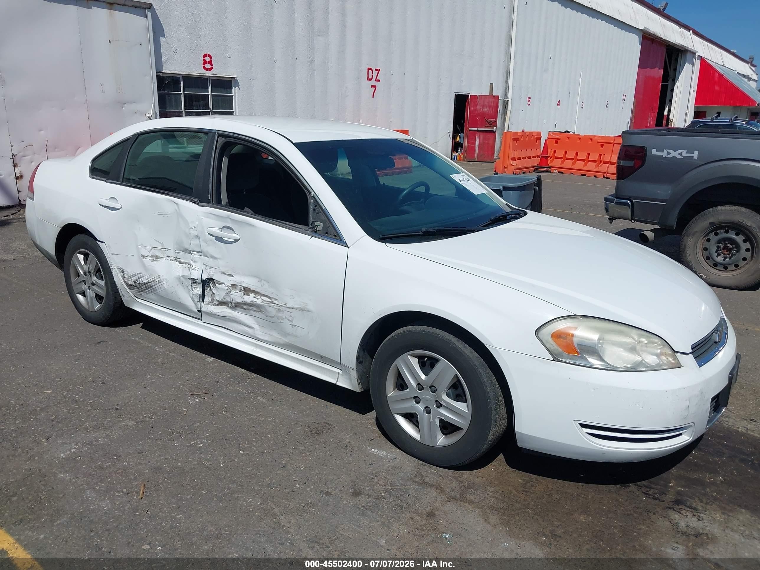 2010 Chevrolet Impala LS, VIN 2G1WA5EK1A1143990 — Side