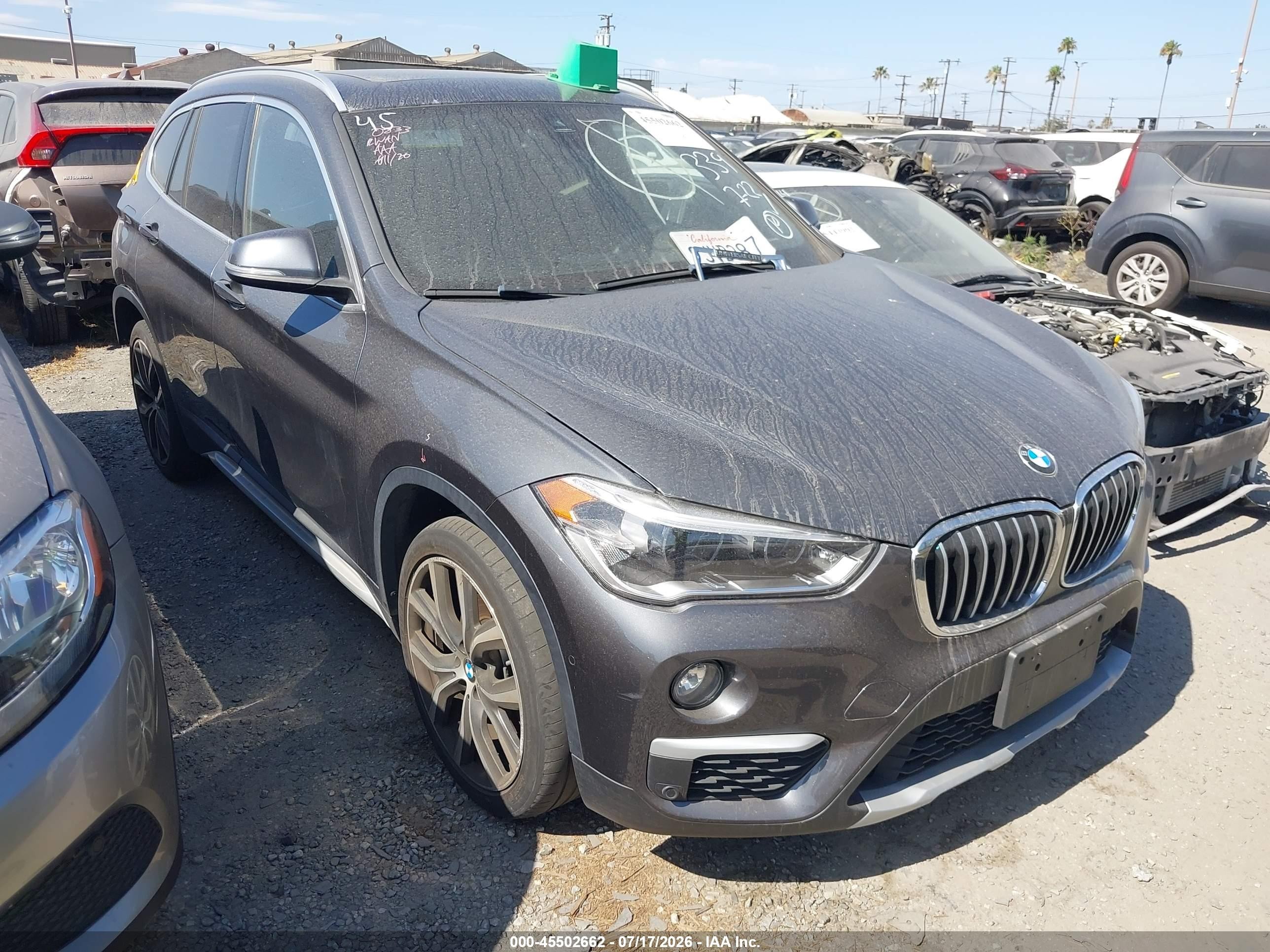 2019 BMW X1 sDrive28i, VIN WBXHU7C51K5N05528 — Rear end