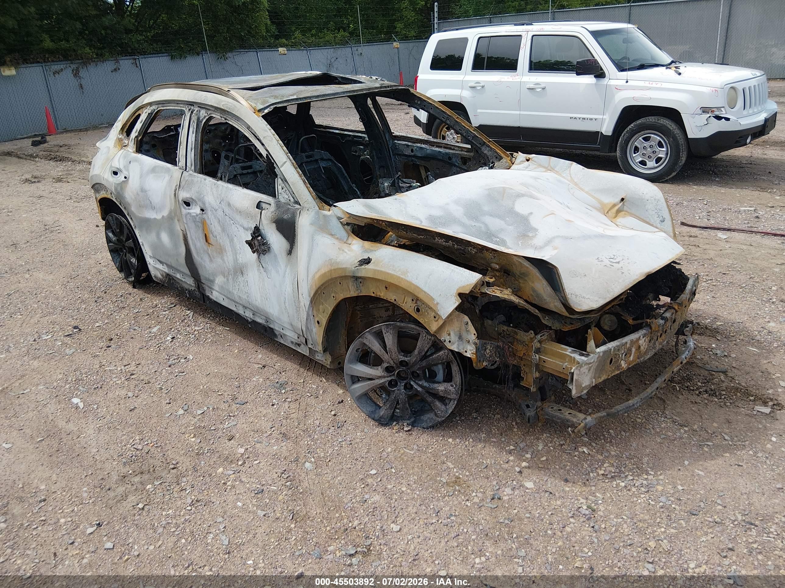 2022 Mazda CX-30 S Carbon Edition, VIN 3MVDMBCL9NM434931 — Burn