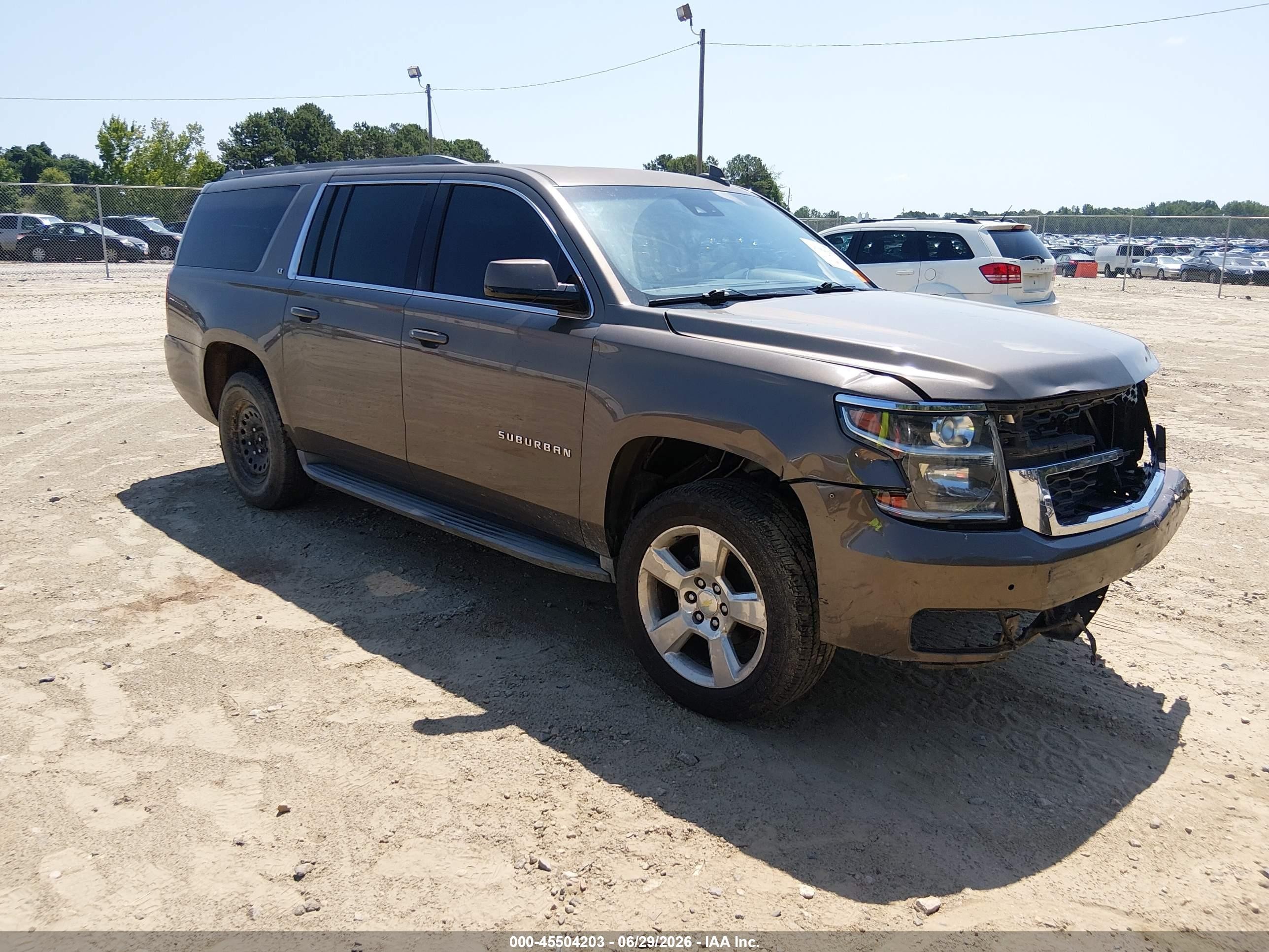 2016 Chevrolet Suburban LT, VIN 1GNSCHKC0GR125499 — Front end