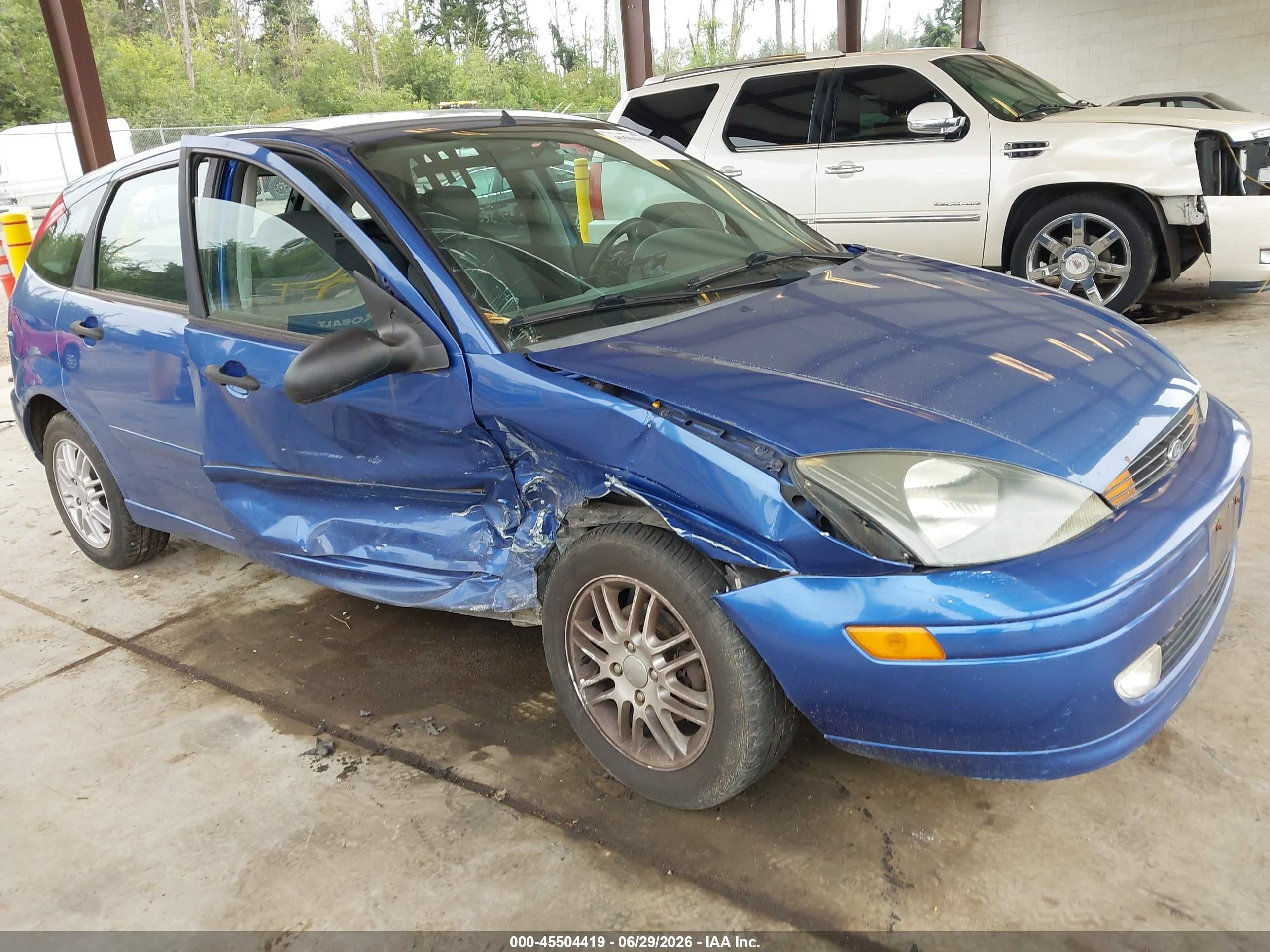 2003 Ford Focus ZX5, VIN 3FAFP37393R132319 — Side