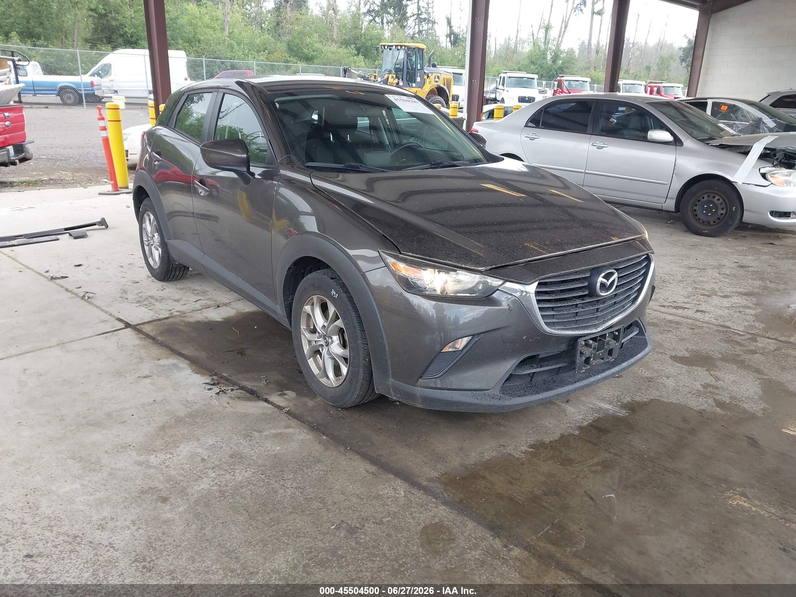 2017 Mazda CX-3 Sport, VIN JM1DKFB70H0165938 — Side