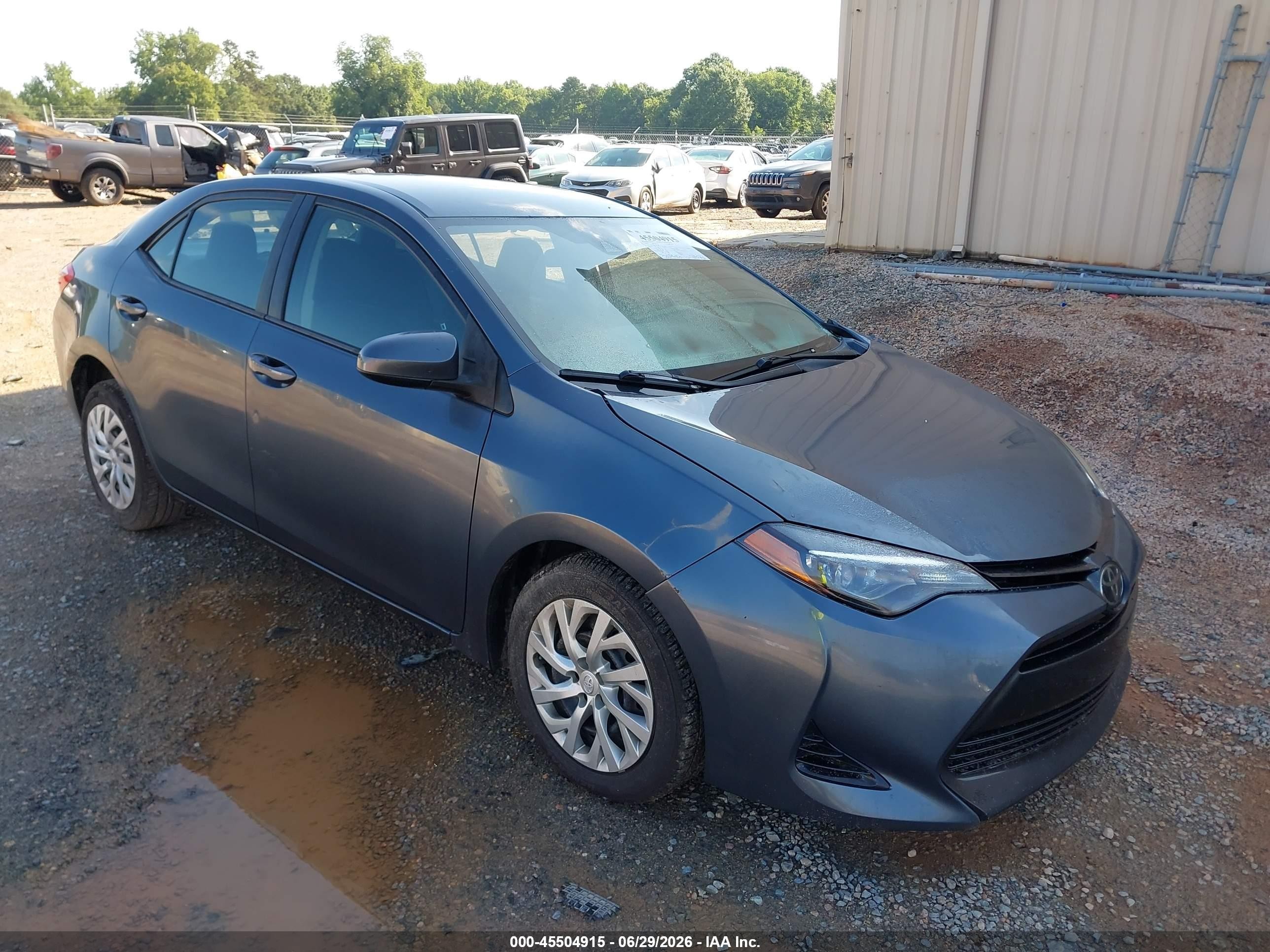 2018 Toyota Corolla LE, VIN 5YFBURHE1JP787730 — Side