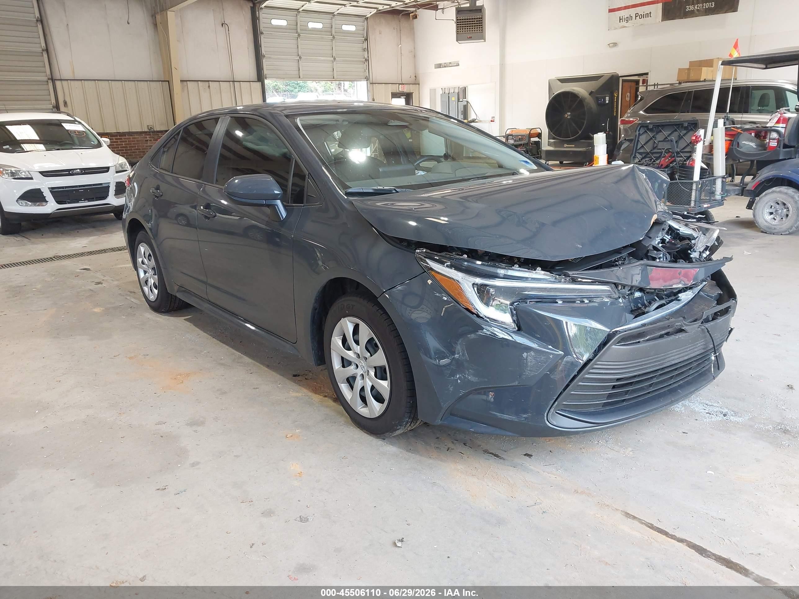 2026 Toyota Corolla Hybrid LE, VIN JTDBCMFE9T3131120 — Front end