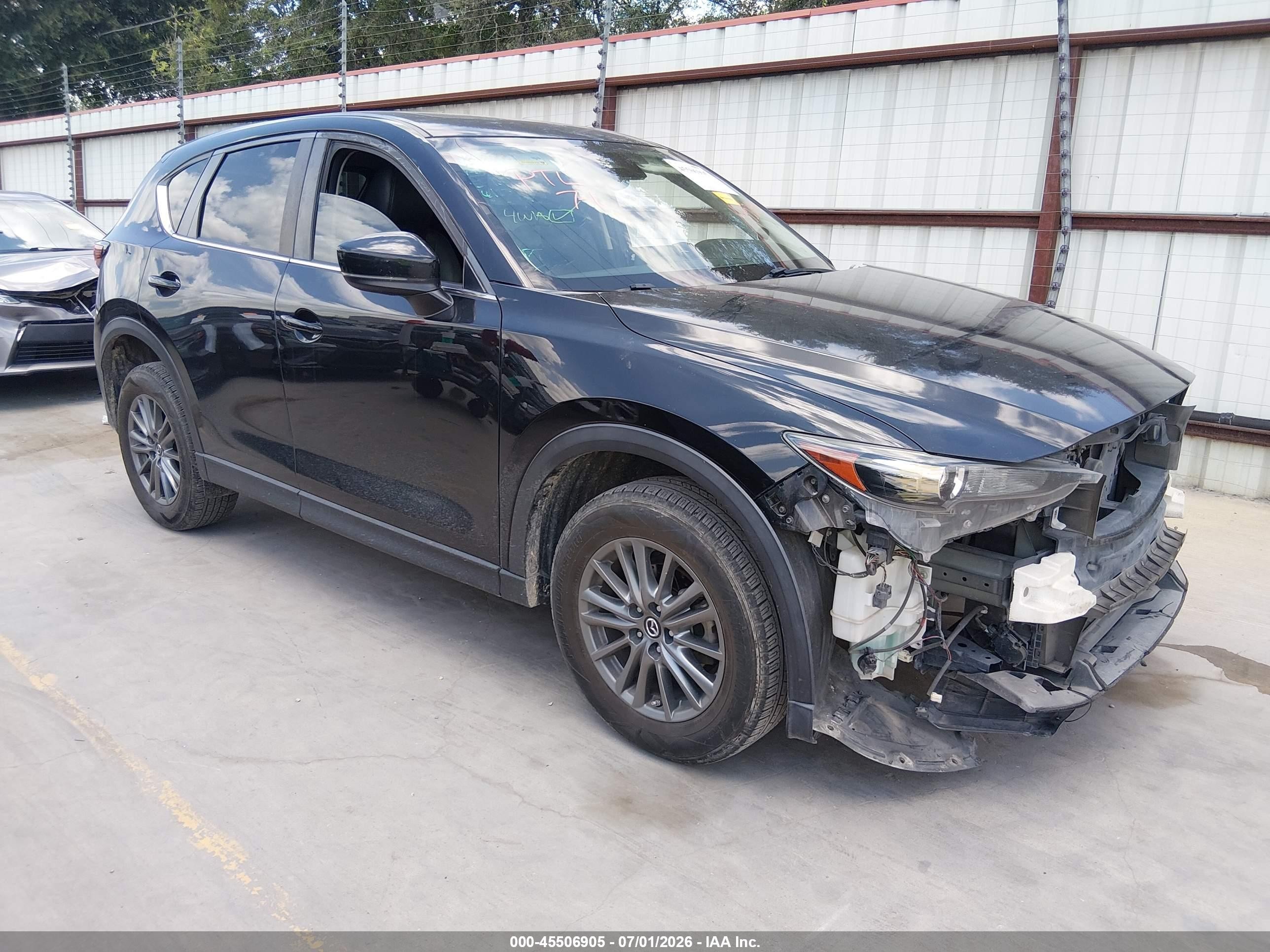 2017 Mazda CX-5 Touring, VIN JM3KFACLXH0197880 — Front end