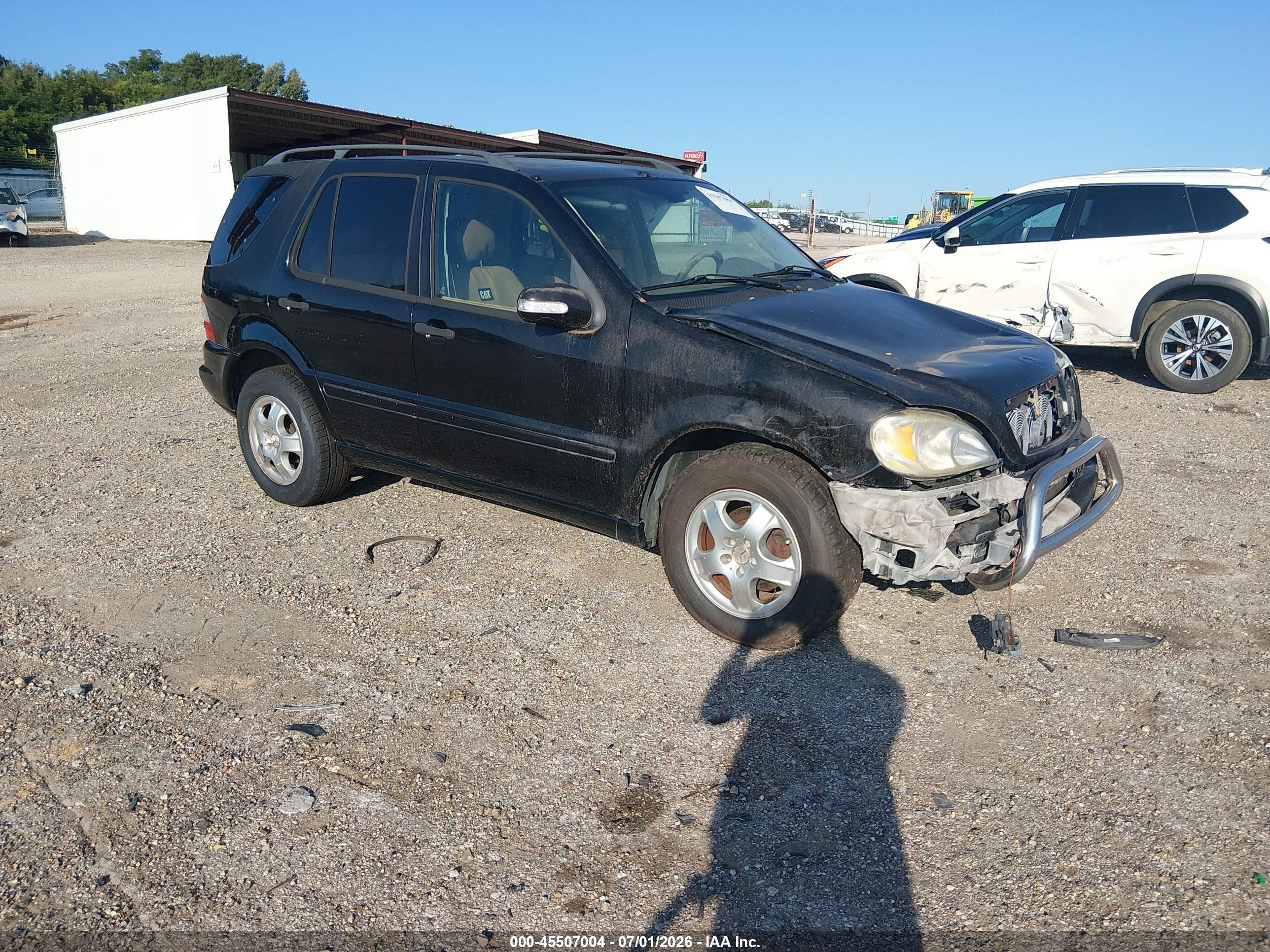 2003 Mercedes-Benz M 320, VIN 4JGAB54E13A394605 — Normal wear