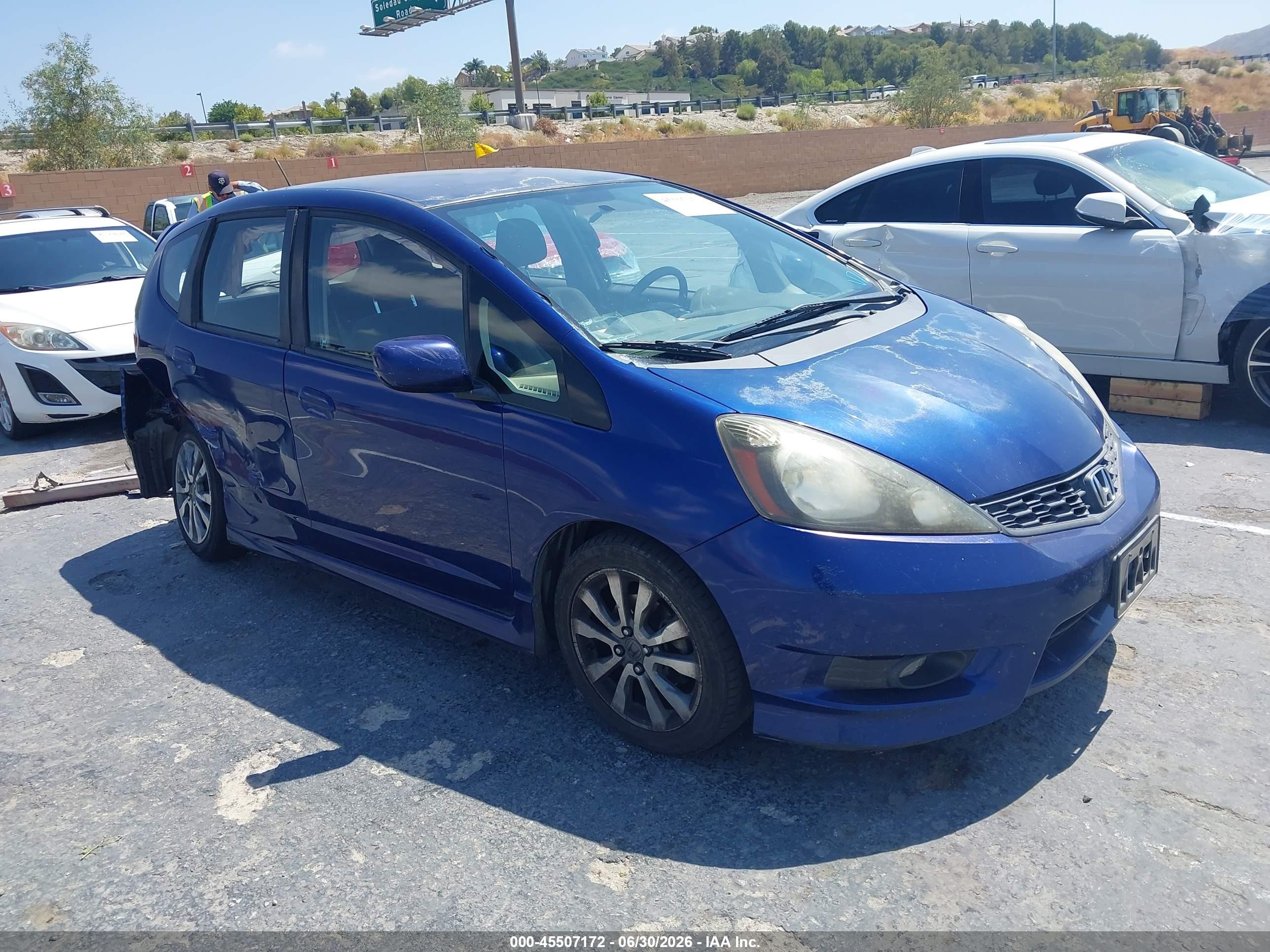 2012 Honda Fit Sport, VIN JHMGE8H59CC017315 — Side