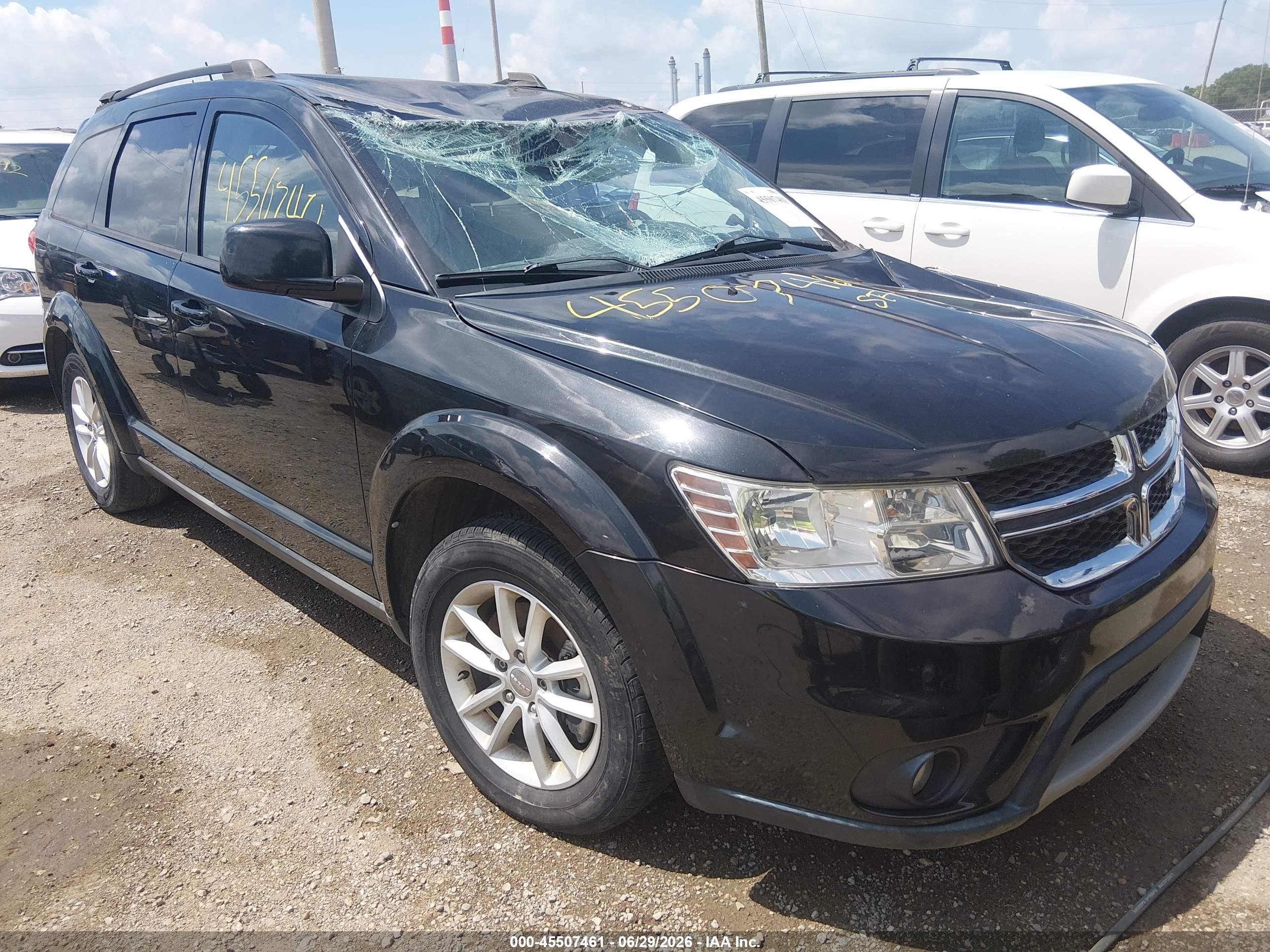 2013 Dodge Journey SXT, VIN 3C4PDCBG5DT555419 — Storm