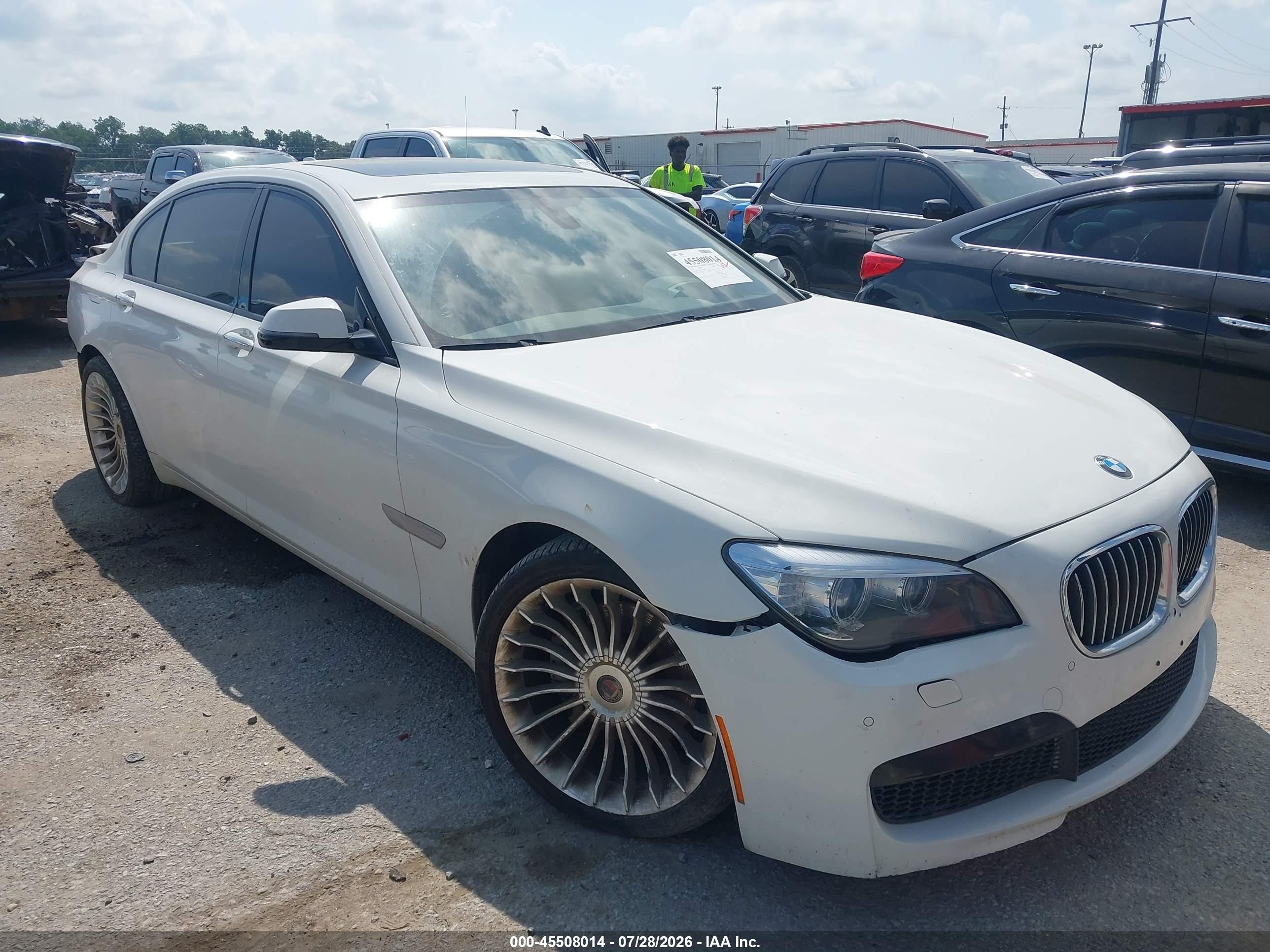 2015 BMW 7 Series 740Li xDrive, VIN WBAYF4C56FGS99409 — Rear end