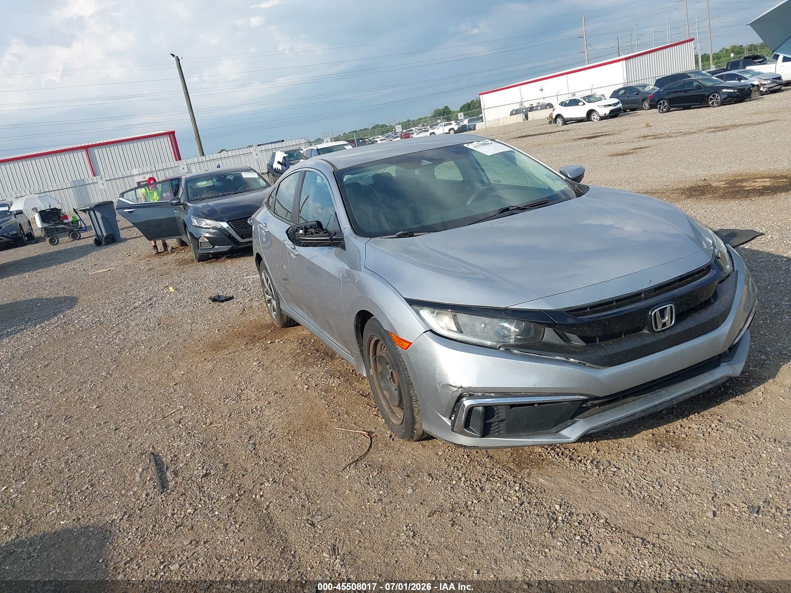 2019 Honda Civic LX, VIN 19XFC2F6XKE048382 — Storm