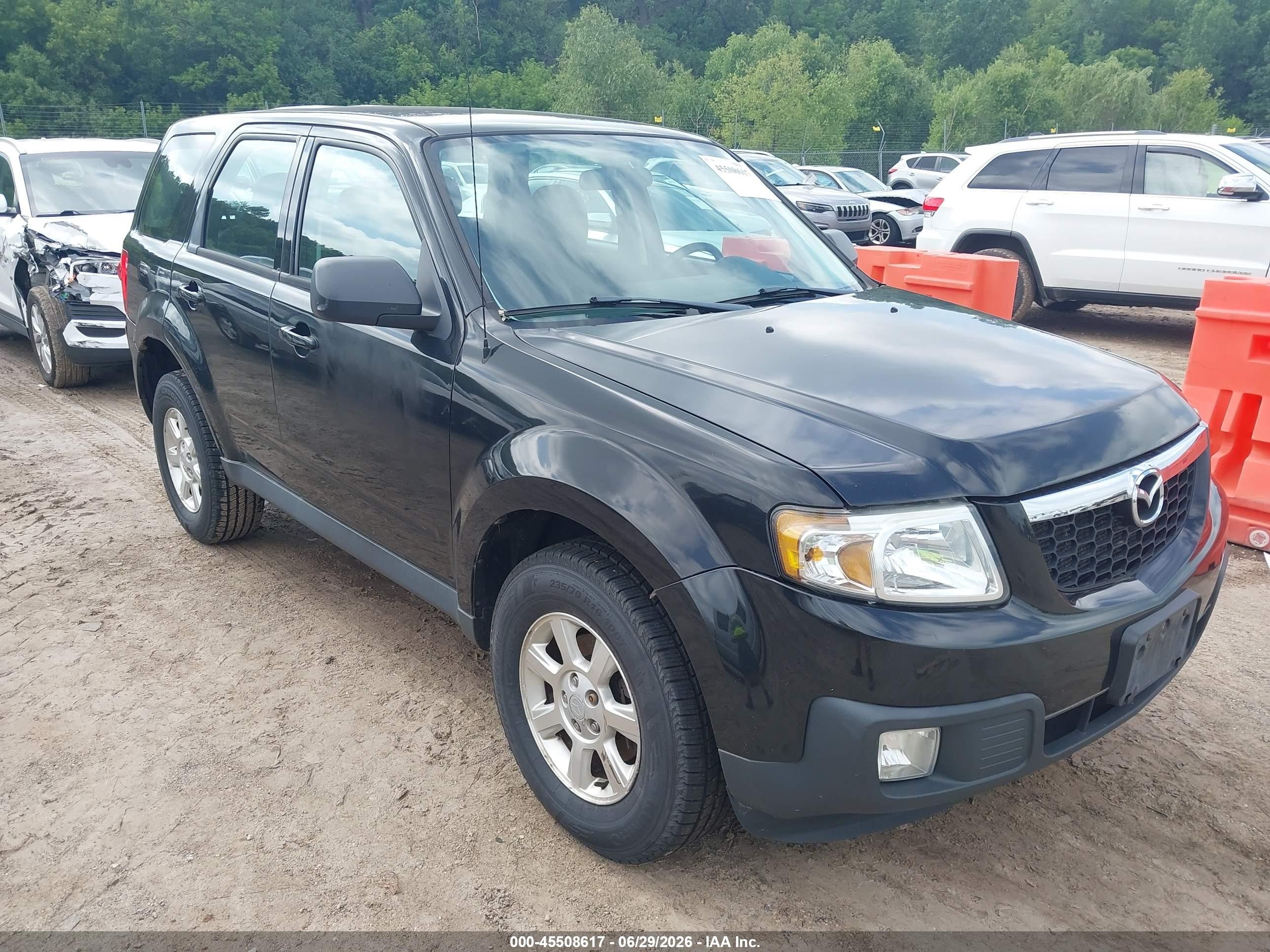 2011 Mazda Tribute Touring, VIN 4F2CY9C76BKM02342 — Normal wear