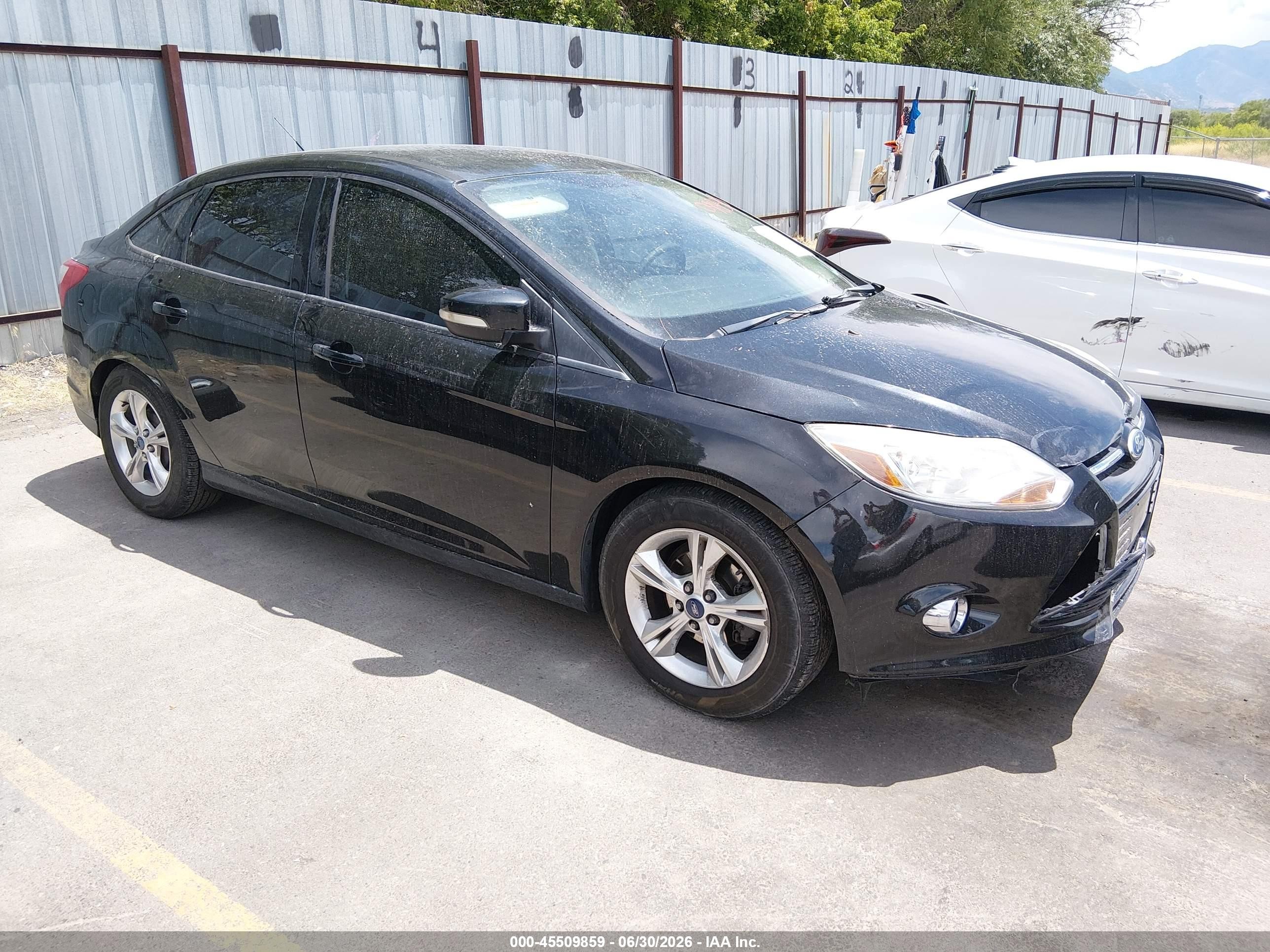 2014 Ford Focus SE, VIN 1FADP3F20EL162357 — Side