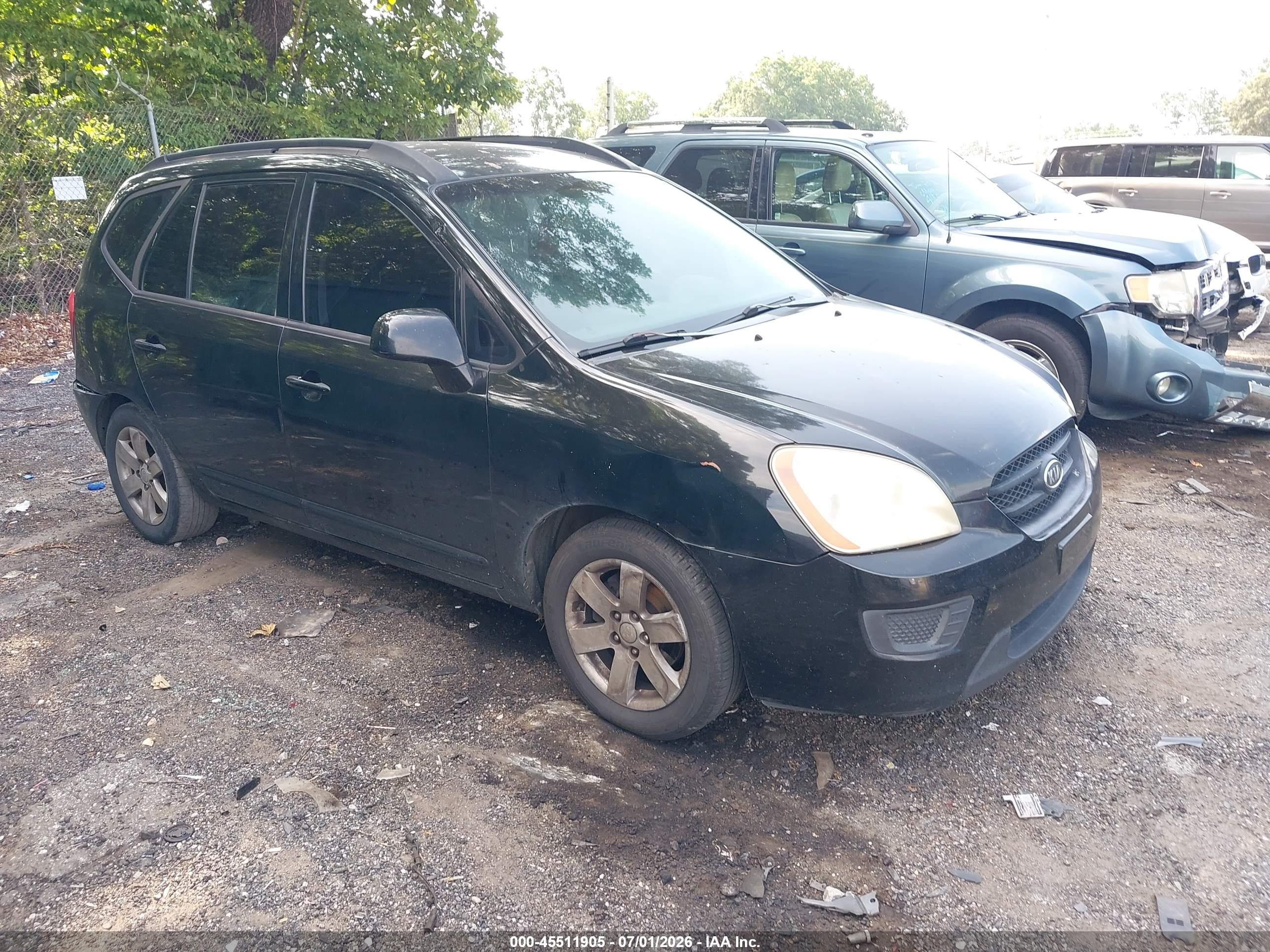 2008 Kia Rondo LX, VIN KNAFG525787210557 — Бок