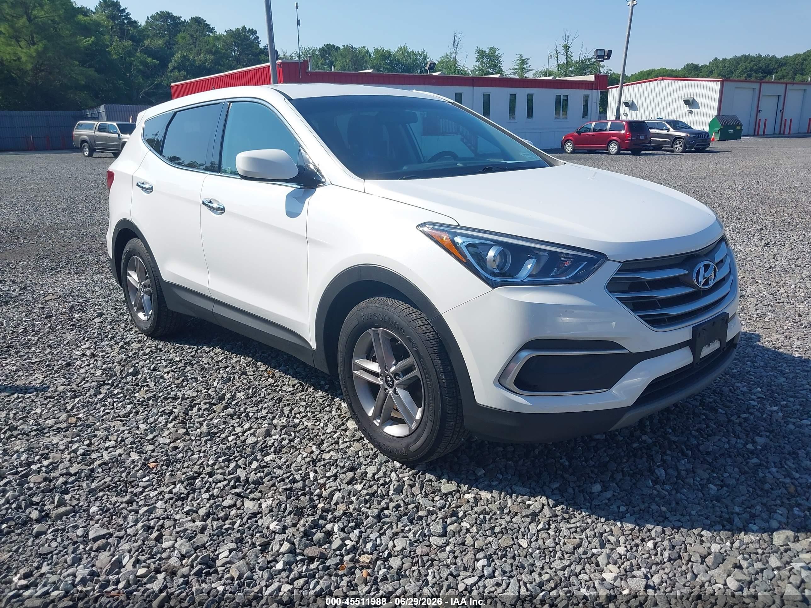 2018 Hyundai Santa Fe 2.4L, VIN 5NMZT3LB9JH105117 — Normal wear