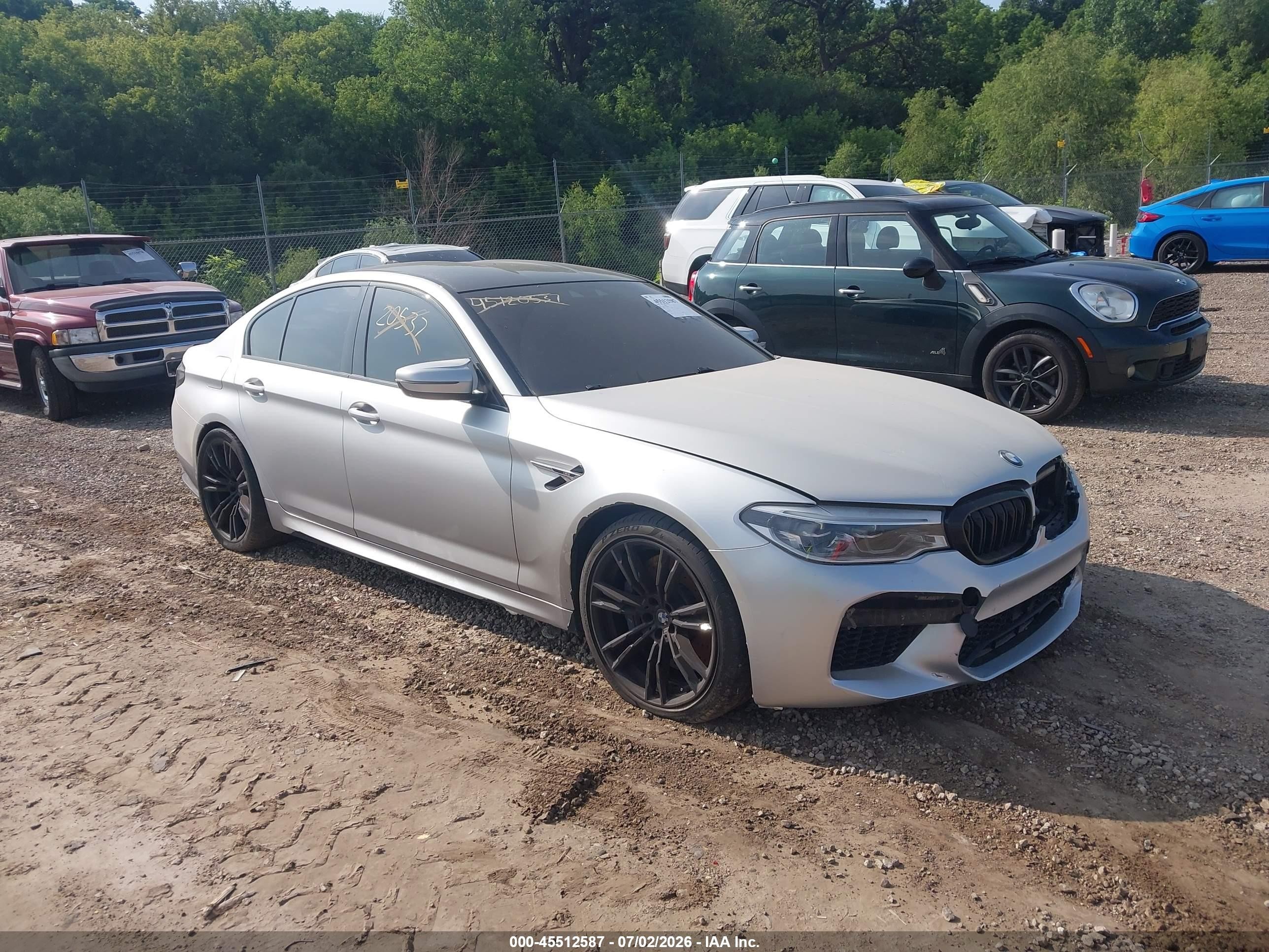 2019 BMW M5, VIN WBSJF0C56KB448186 — Бок