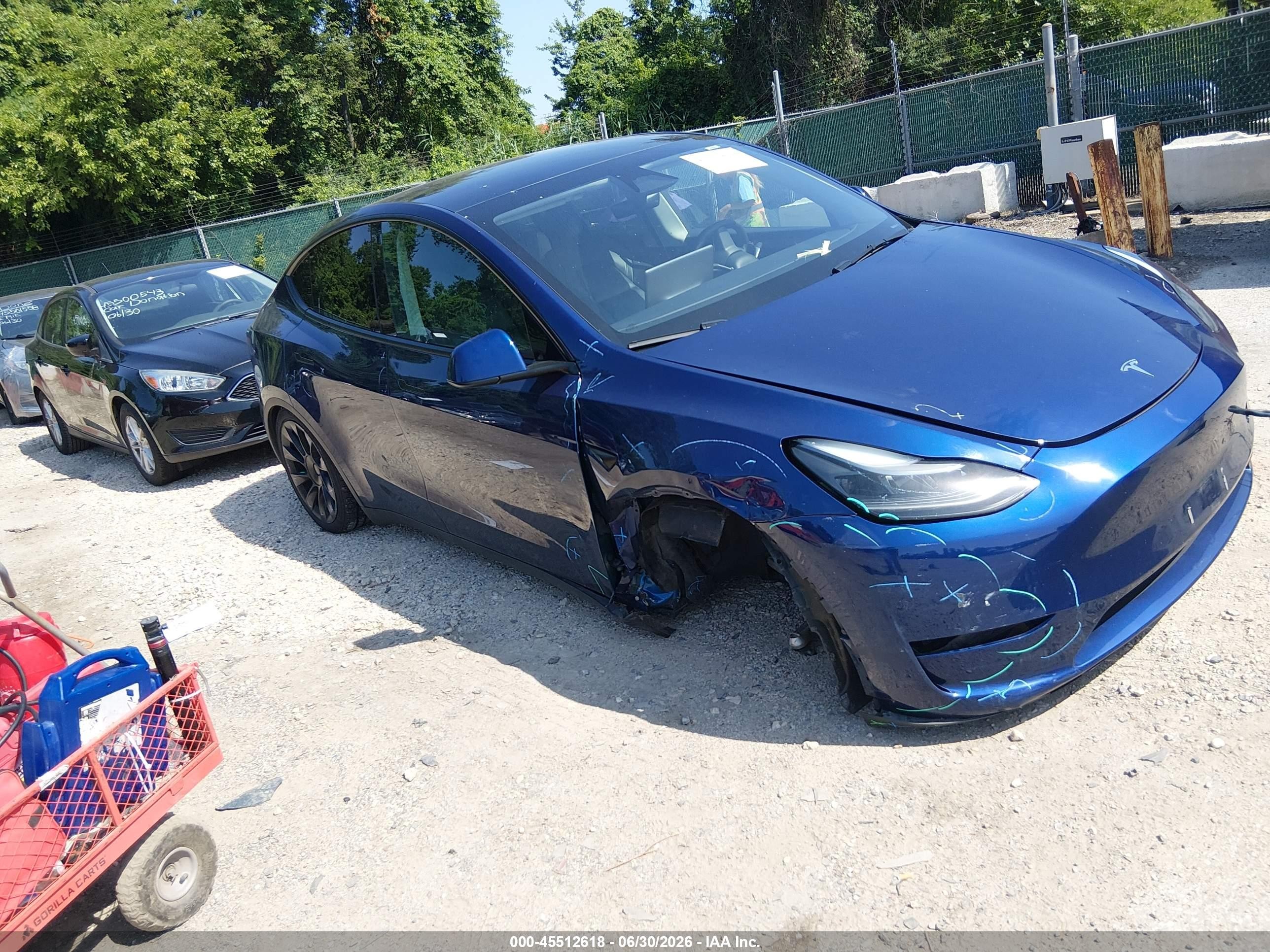 2024 Tesla Model Y Long Range, VIN 7SAYGAEE7RF063560 — Not stated