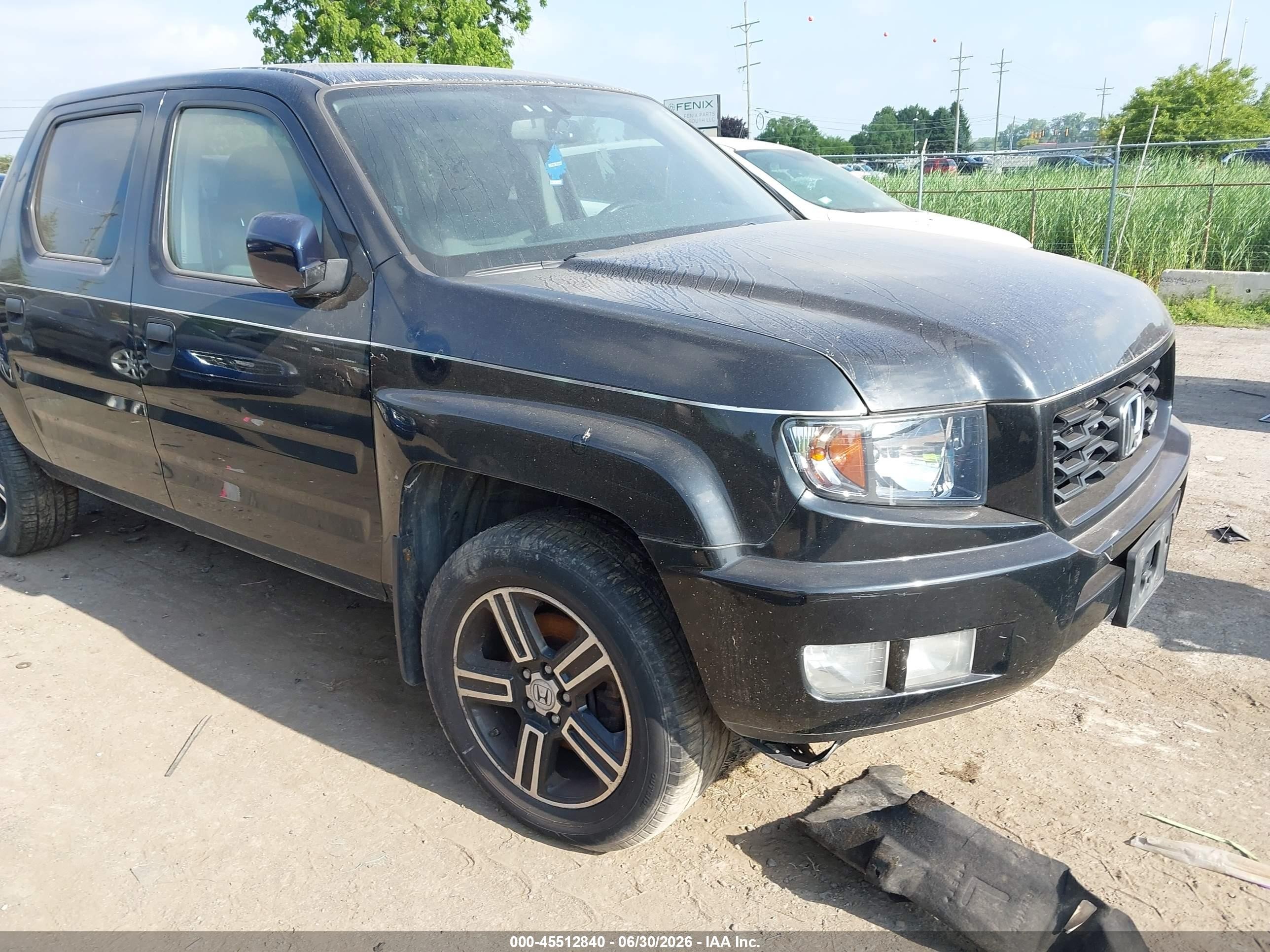 2014 Honda Ridgeline Sport, VIN 5FPYK1F73EB011811 — Normal wear