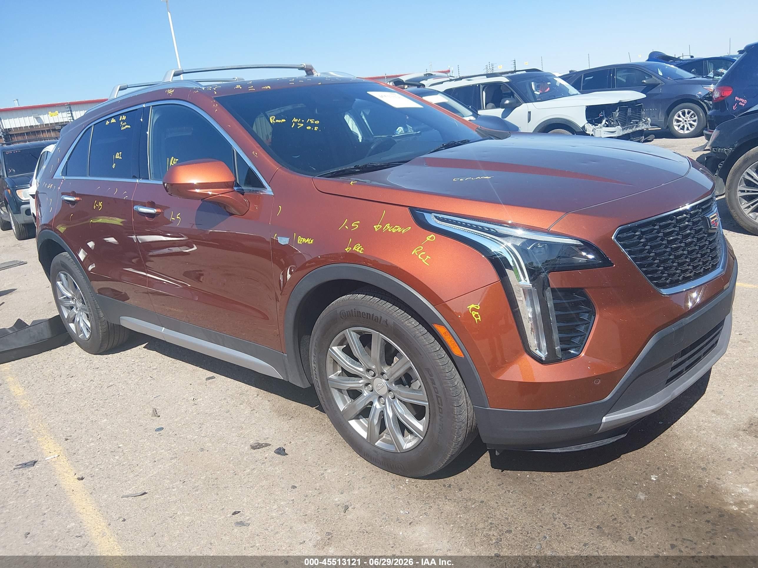 2019 Cadillac XT4 AWD Premium Luxury, VIN 1GYFZDR48KF195305 — Hail