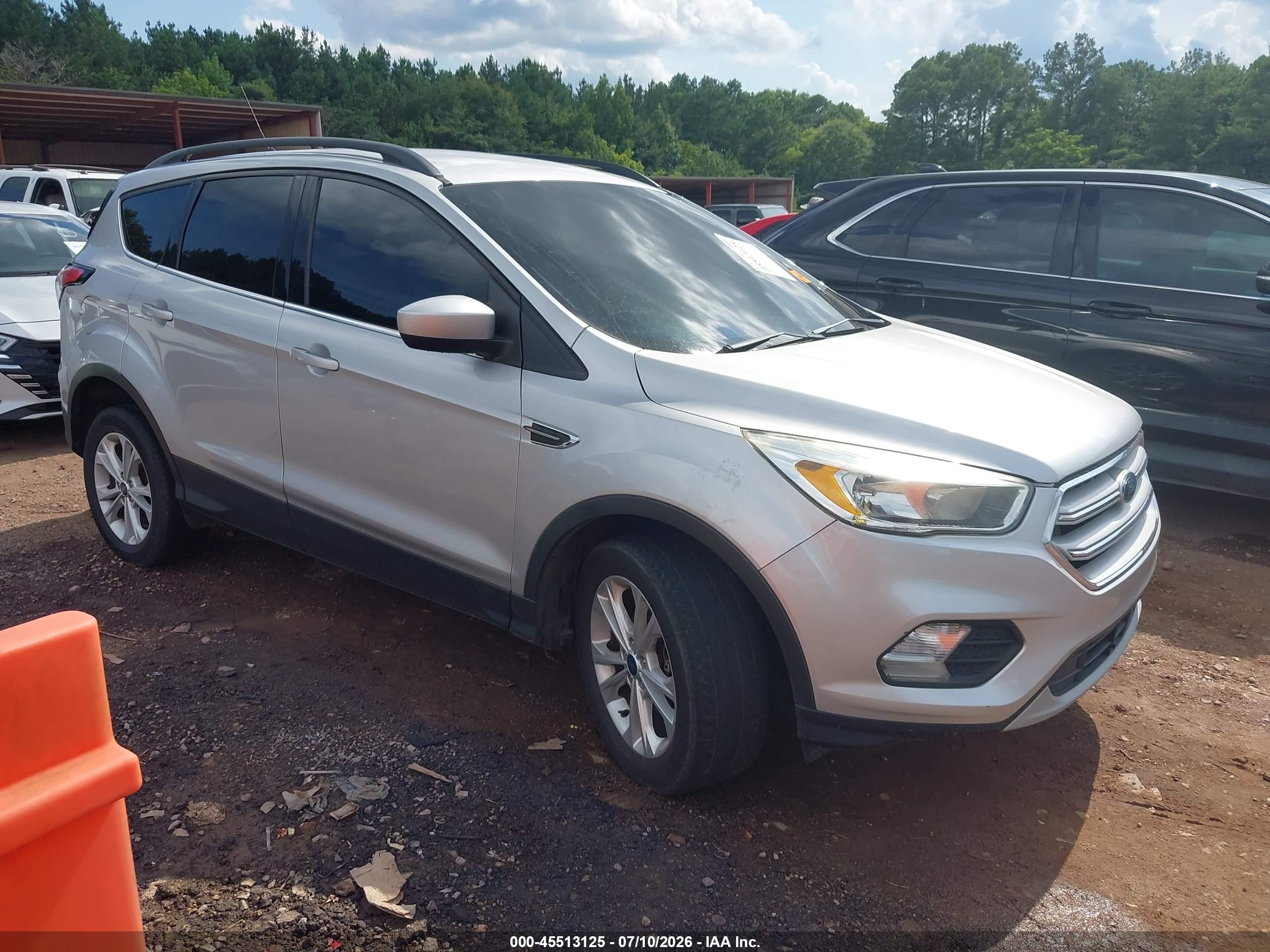 2018 Ford Escape SE, VIN 1FMCU9GD6JUB26741 — Vandalism