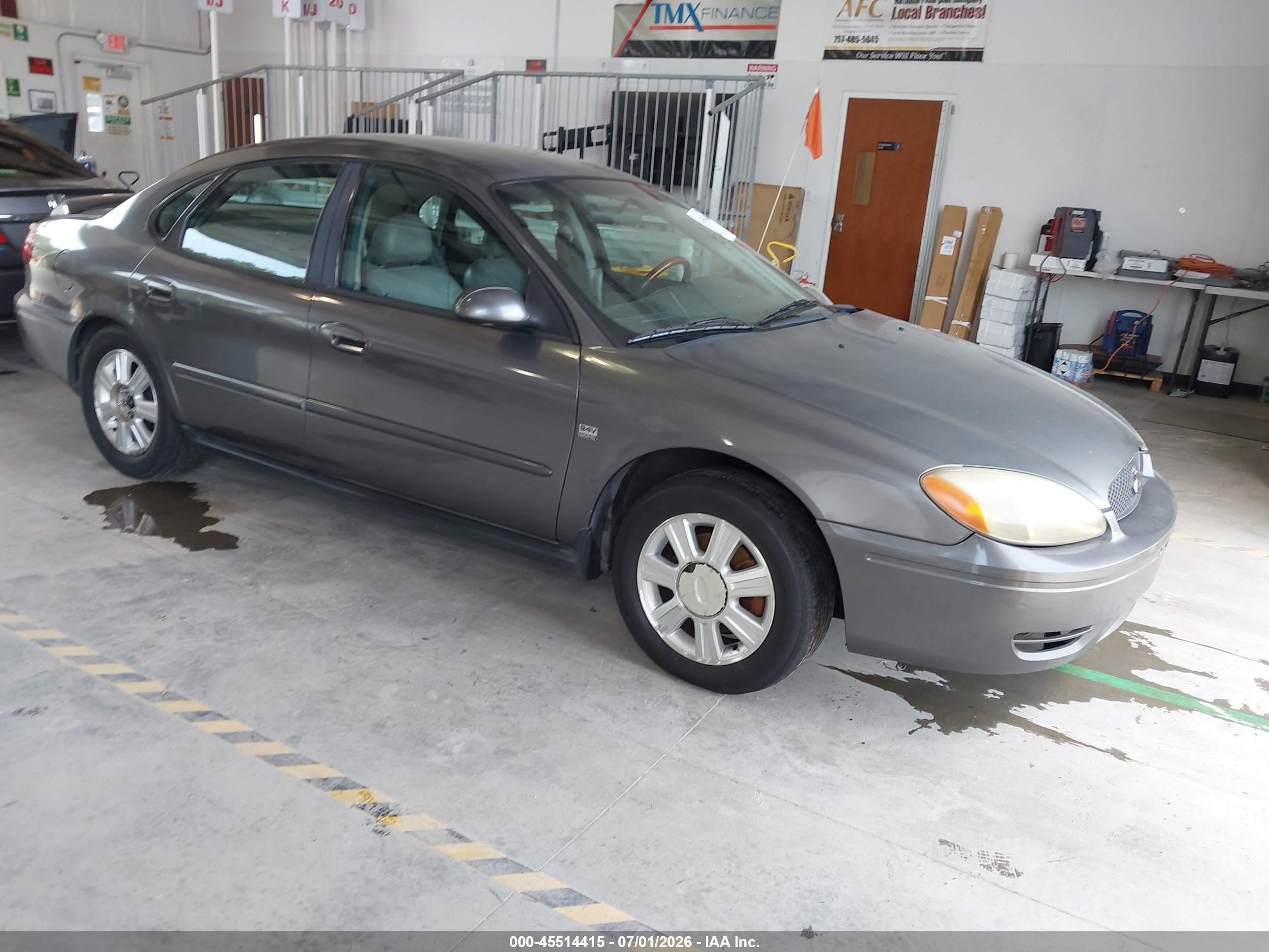 2005 Ford Taurus SEL, VIN 1FAFP56SX5A148031 — Бок